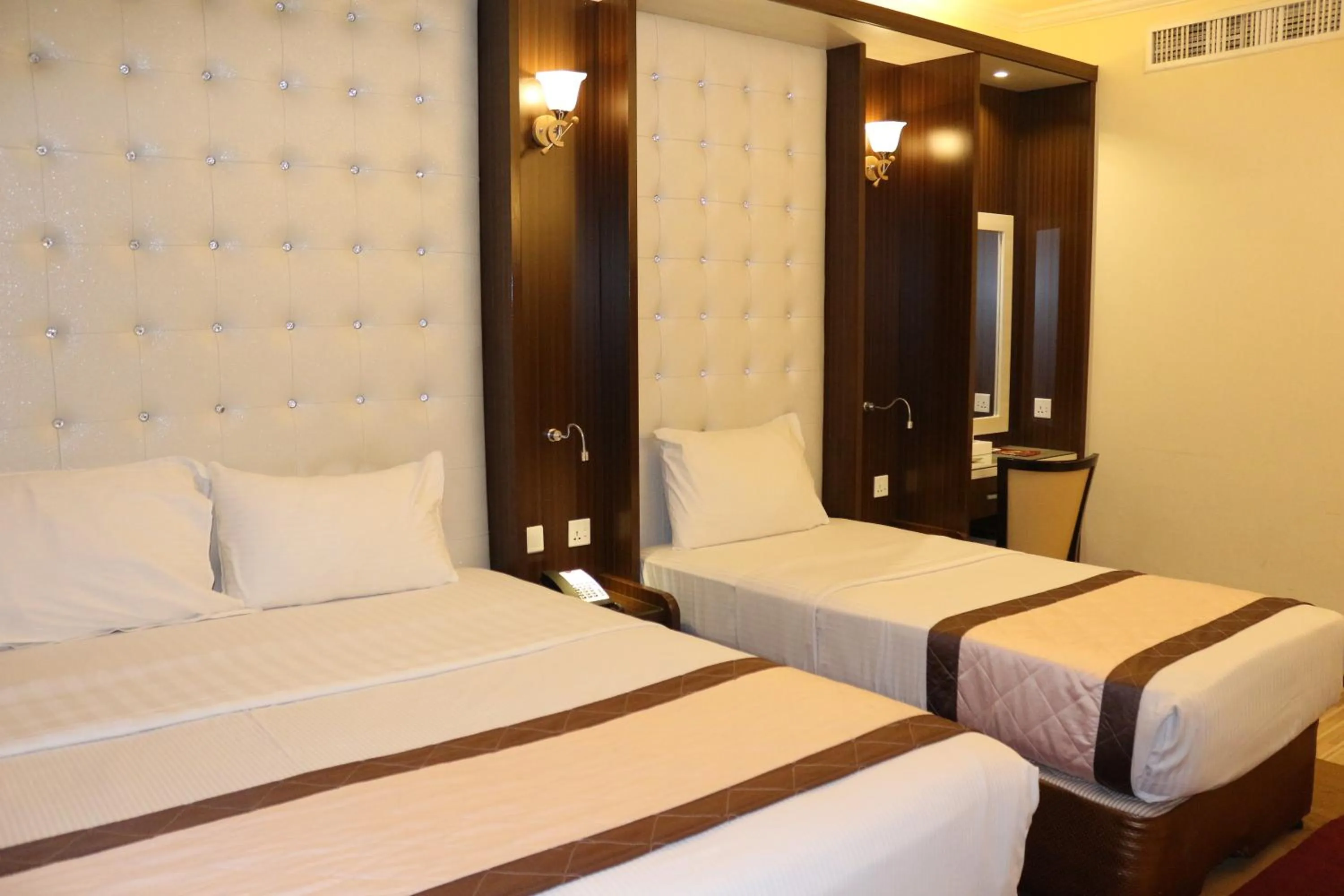 Bed in Al Khaleej Grand Hotel