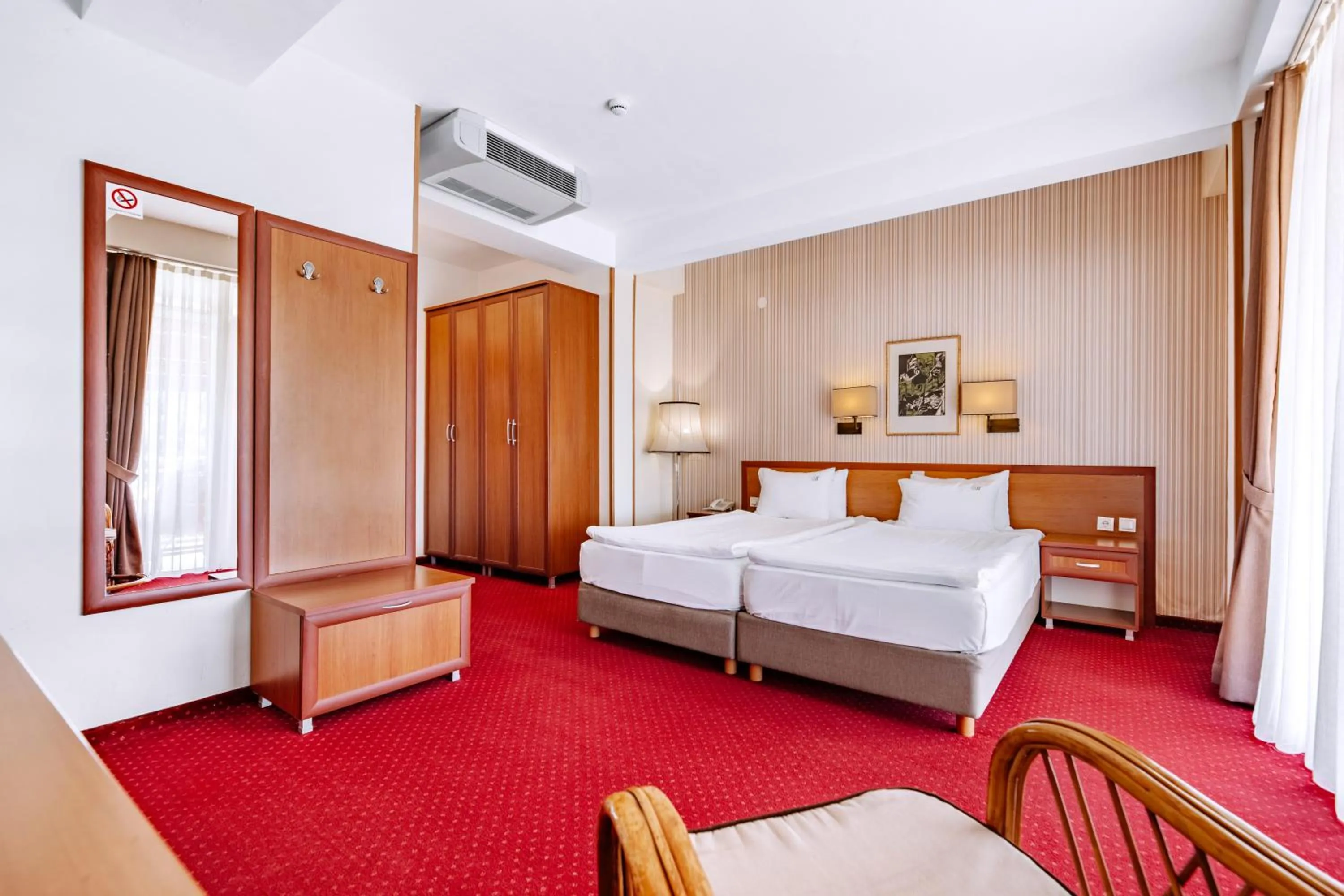 Property building, Bed in Hotel Belvedere