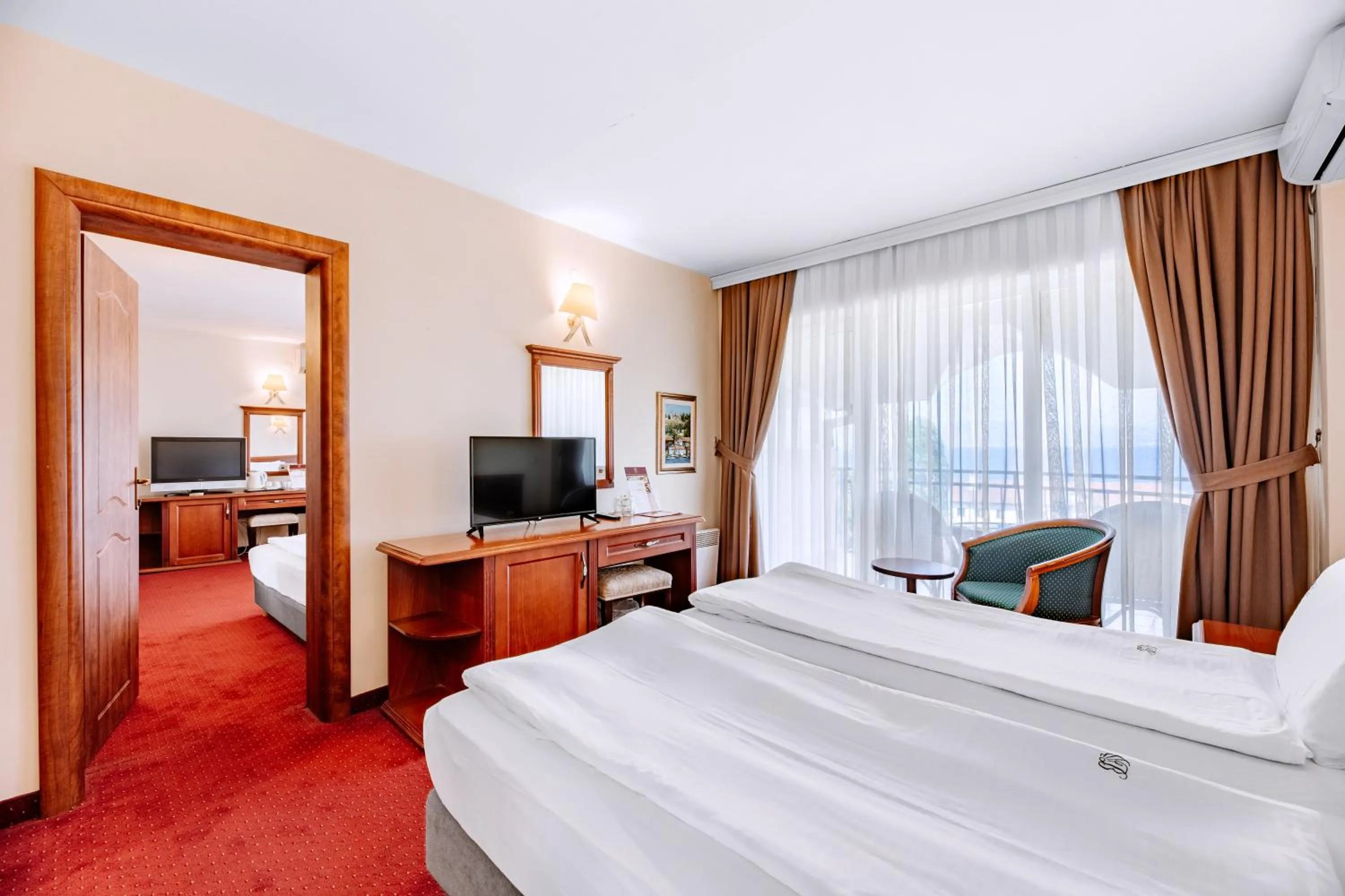 Property building, Bed in Hotel Belvedere