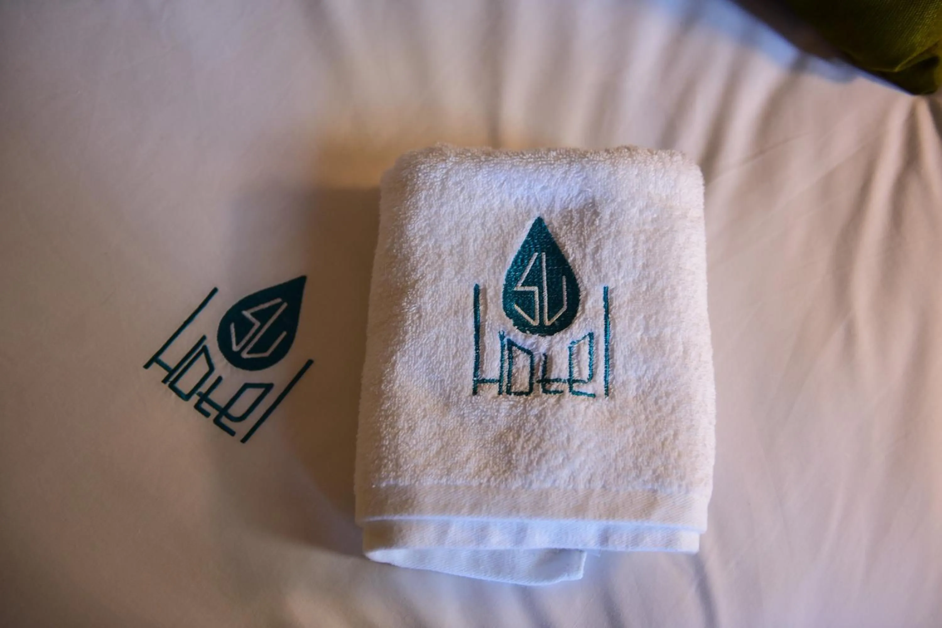 Property logo or sign in SU Hotel