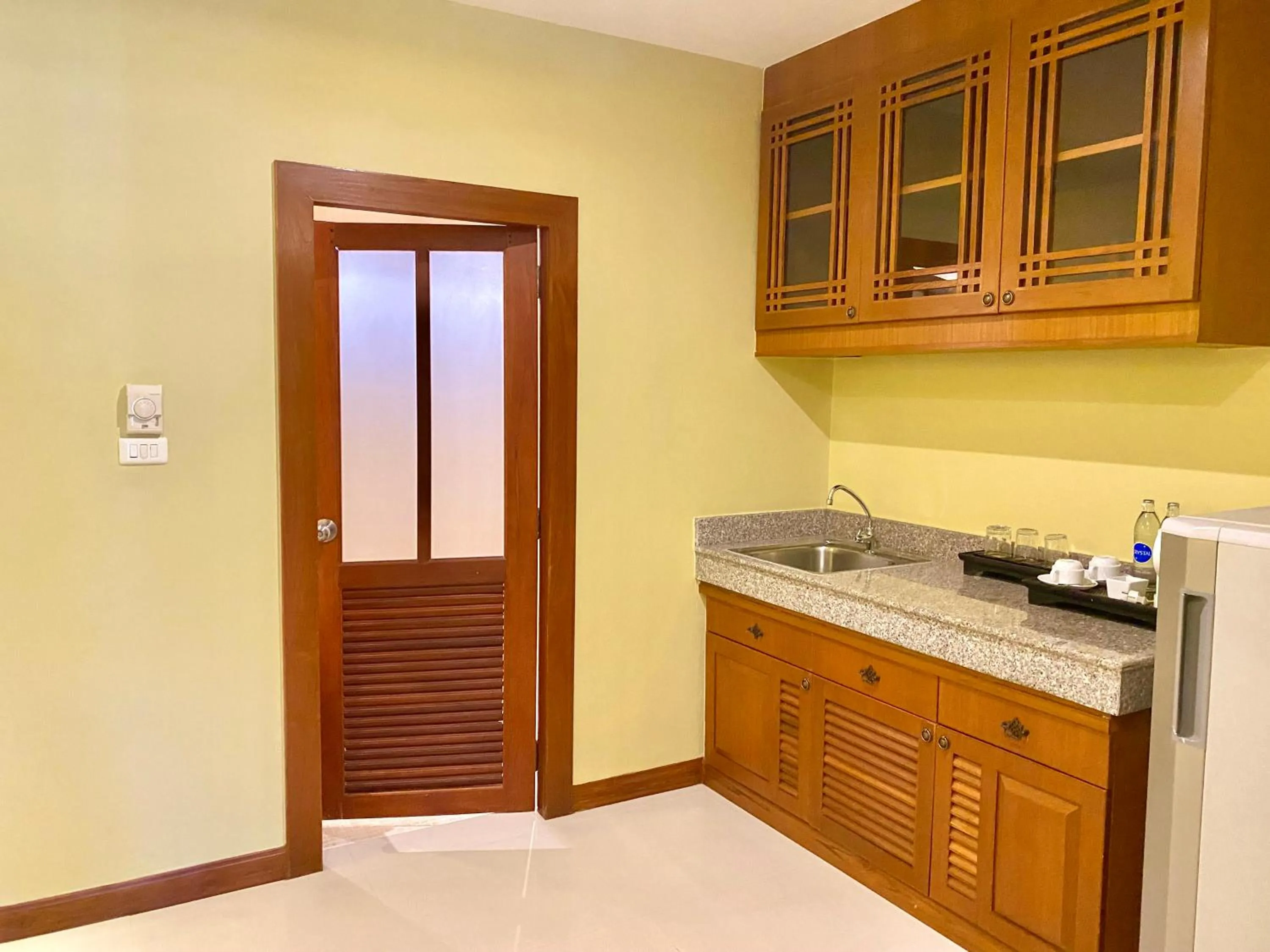 Kitchen or kitchenette in Le Murraya Boutique Serviced Residence & Resort