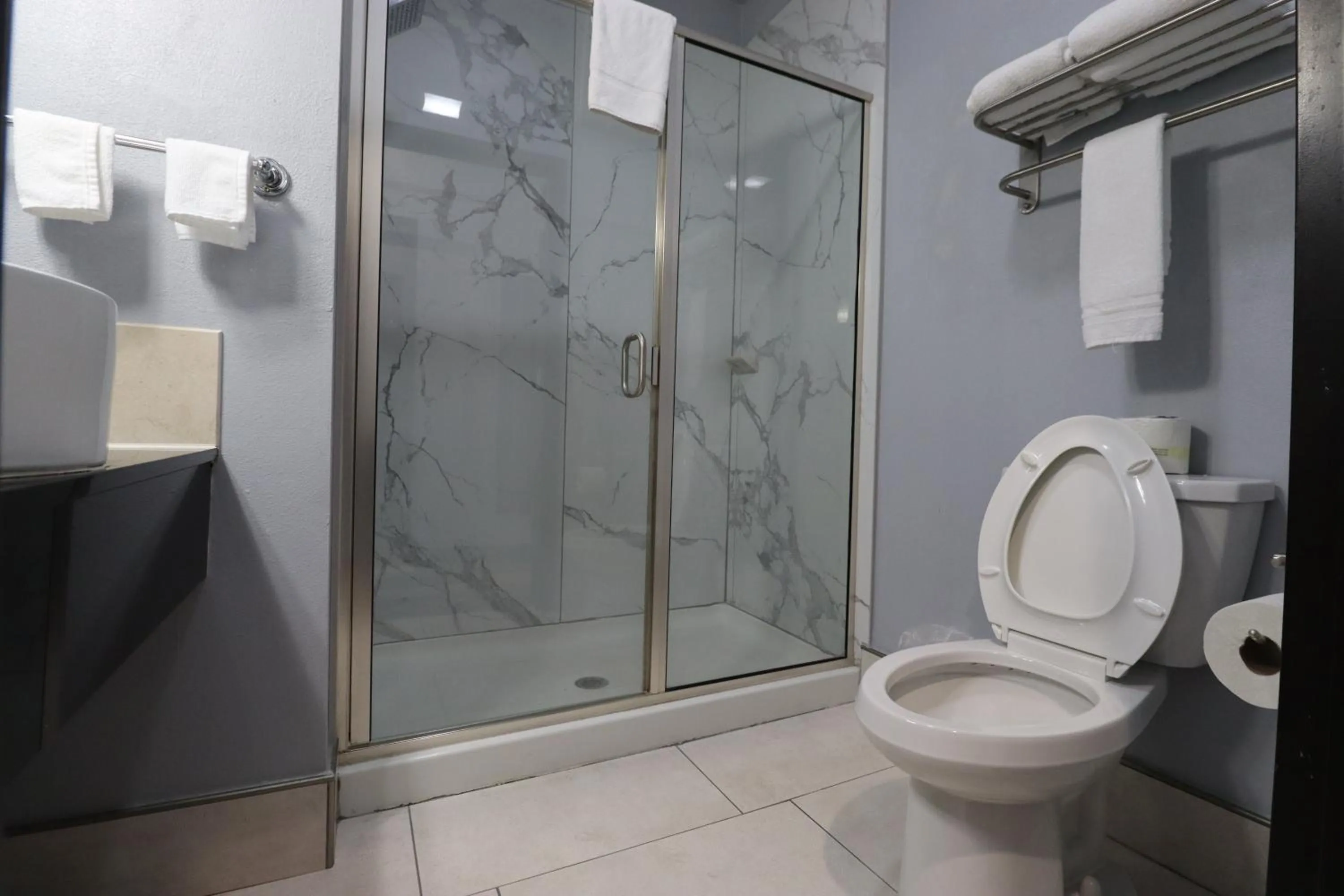 Toilet in Days Inn & Suites by Wyndham Milwaukee