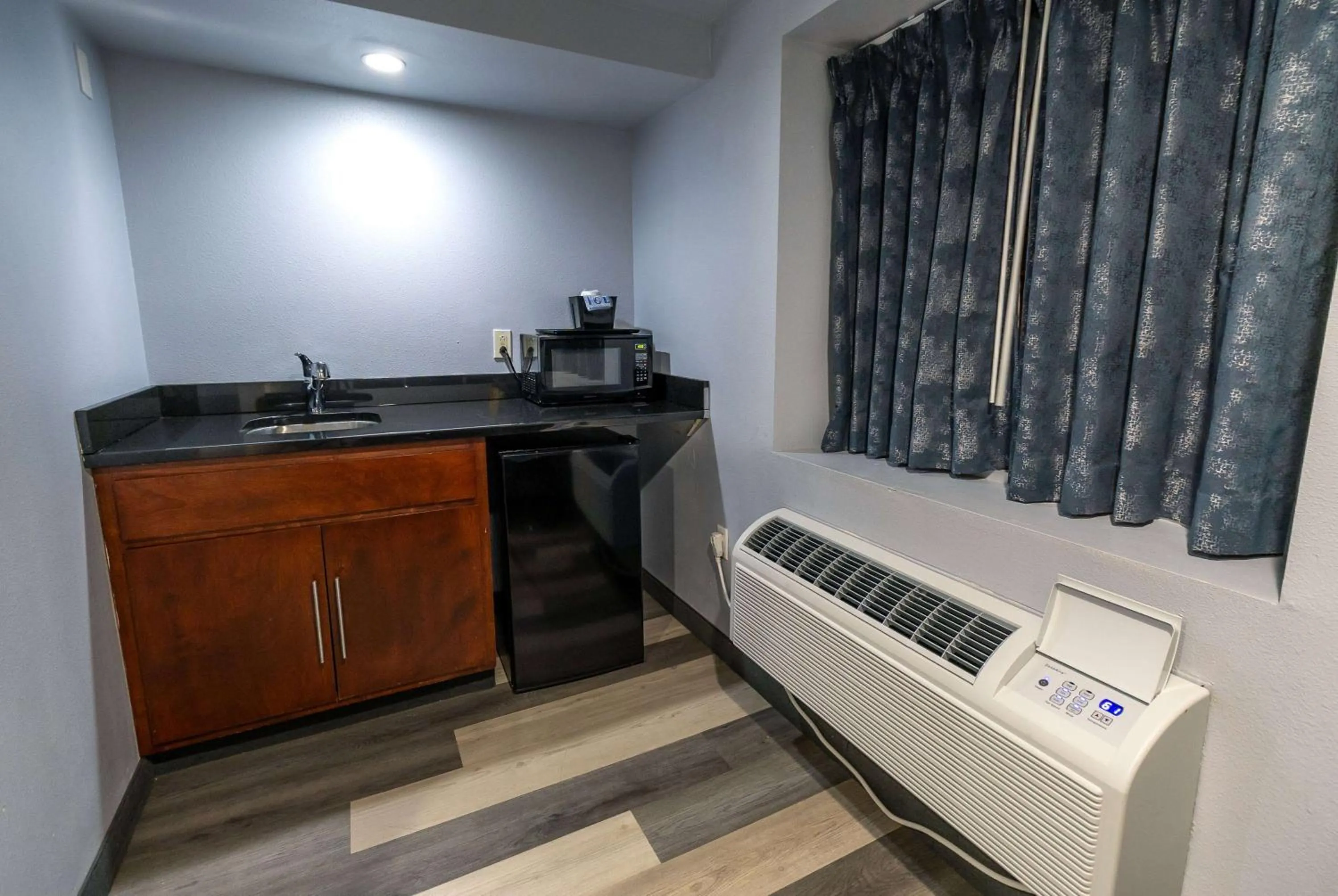 Photo of the whole room in Days Inn & Suites by Wyndham Milwaukee