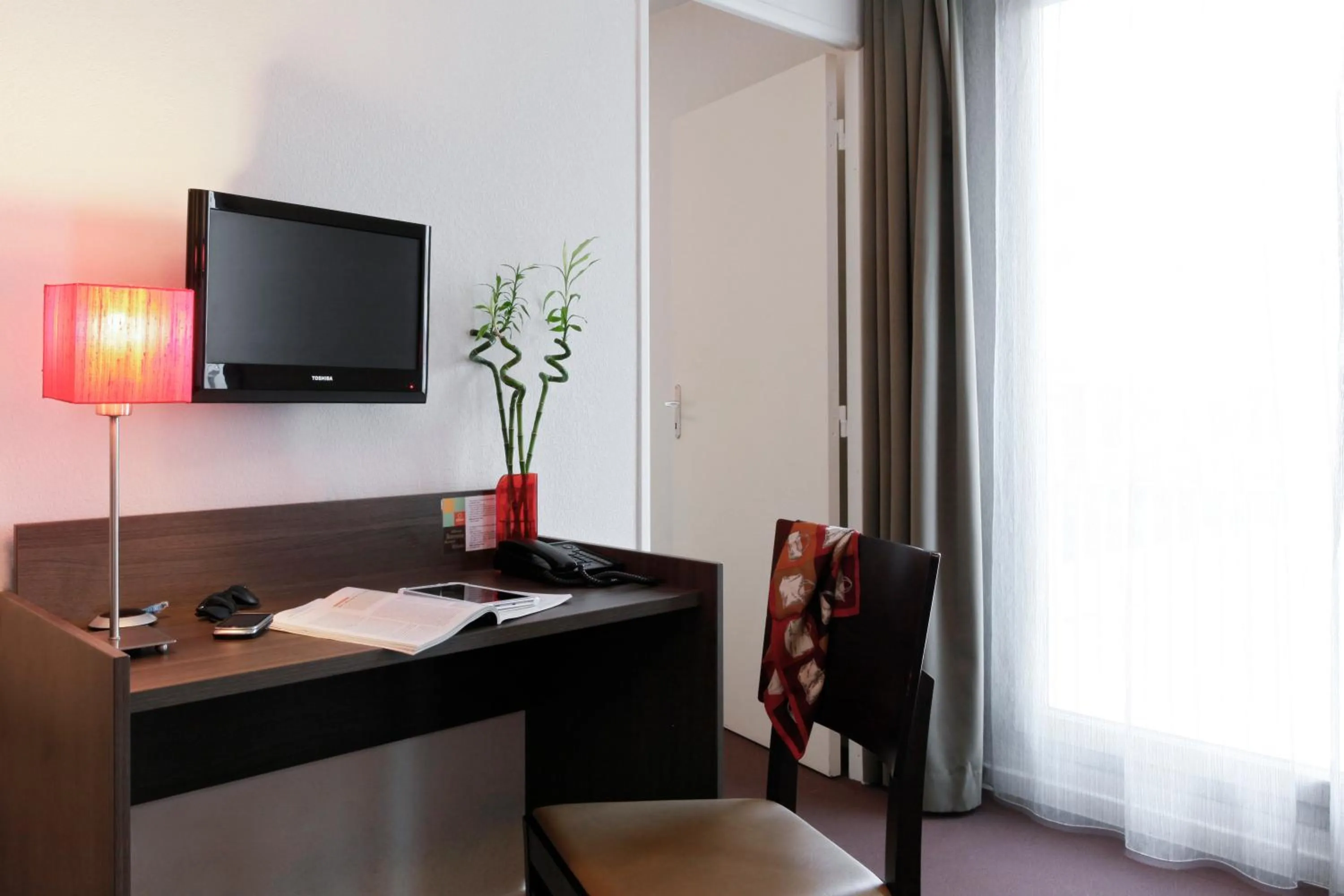 TV and multimedia in Aparthotel Adagio Access Marseille Saint Charles