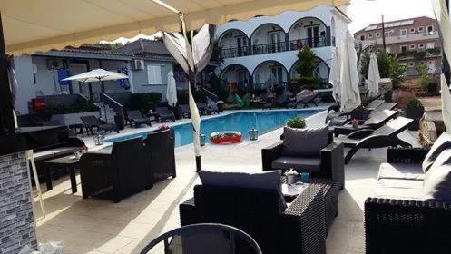 Property logo or sign in Villa Corali Apartments Sea Breath & Pool