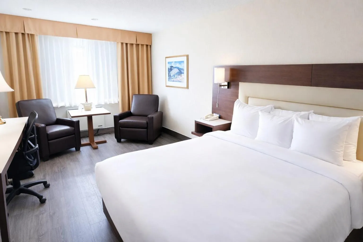 Bed in Quality Inn & Suites