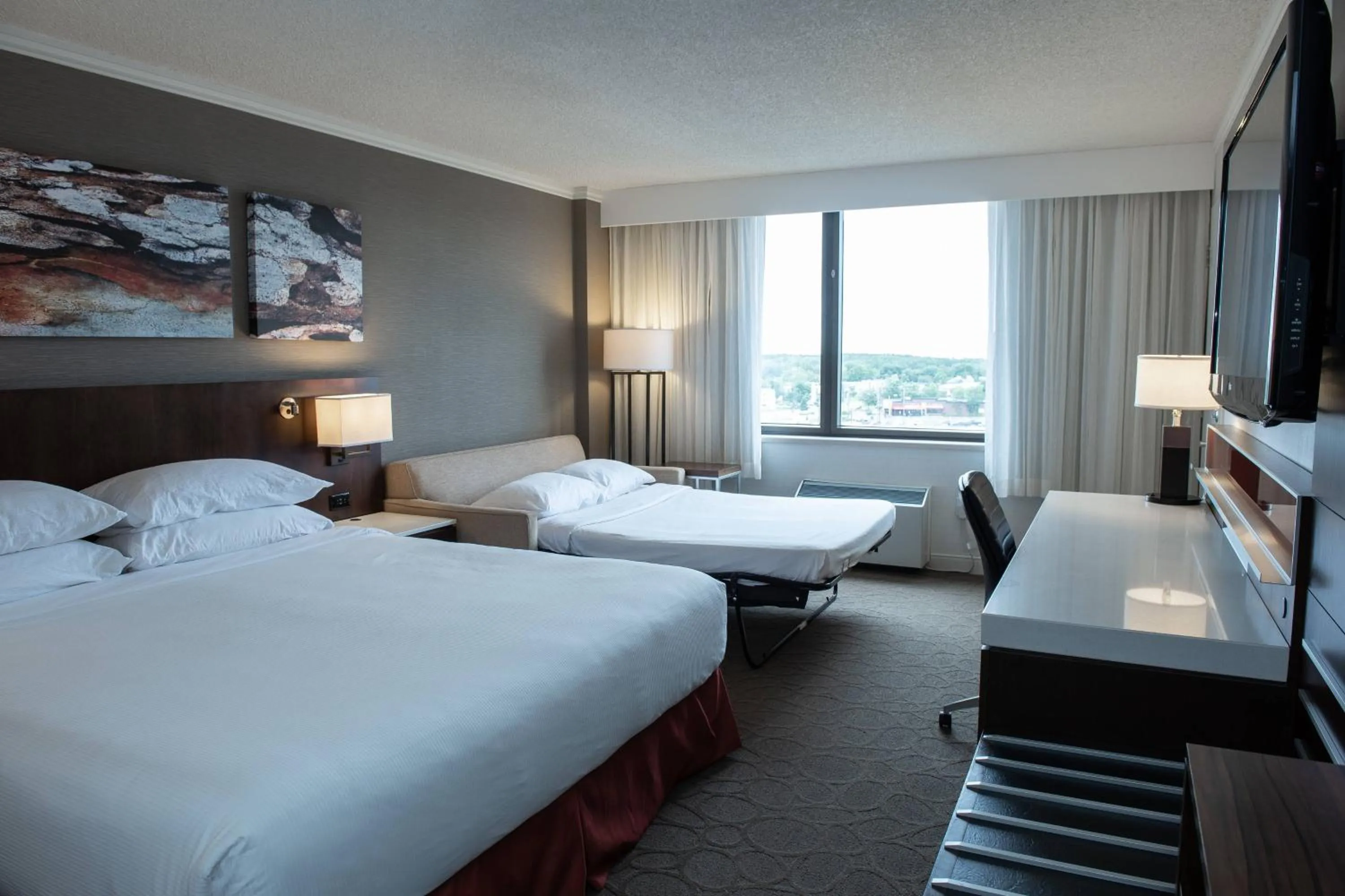 Photo of the whole room, Bed in Delta Hotels by Marriott Saguenay Conference Centre