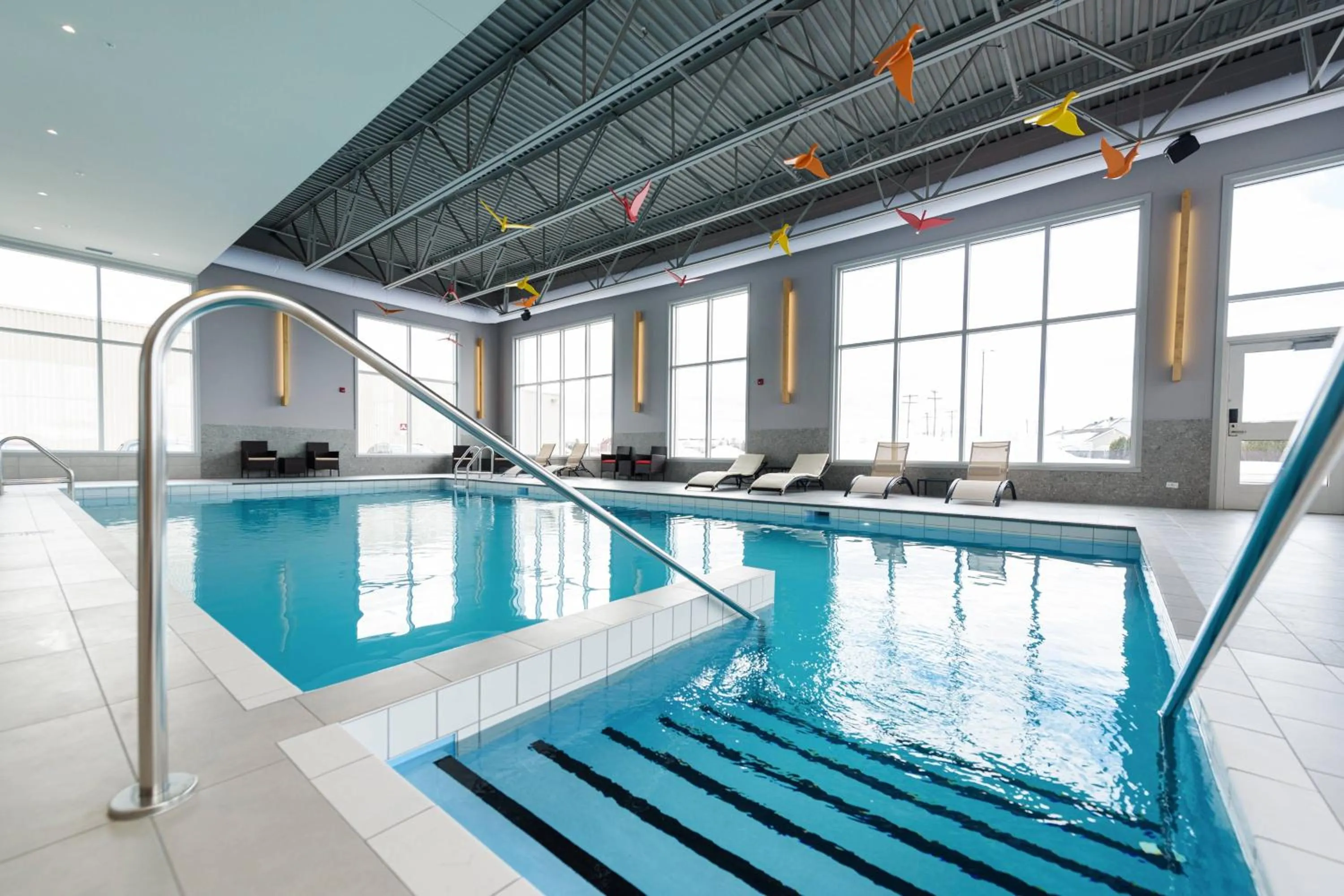 Swimming pool in Delta Hotels by Marriott Saguenay Conference Centre
