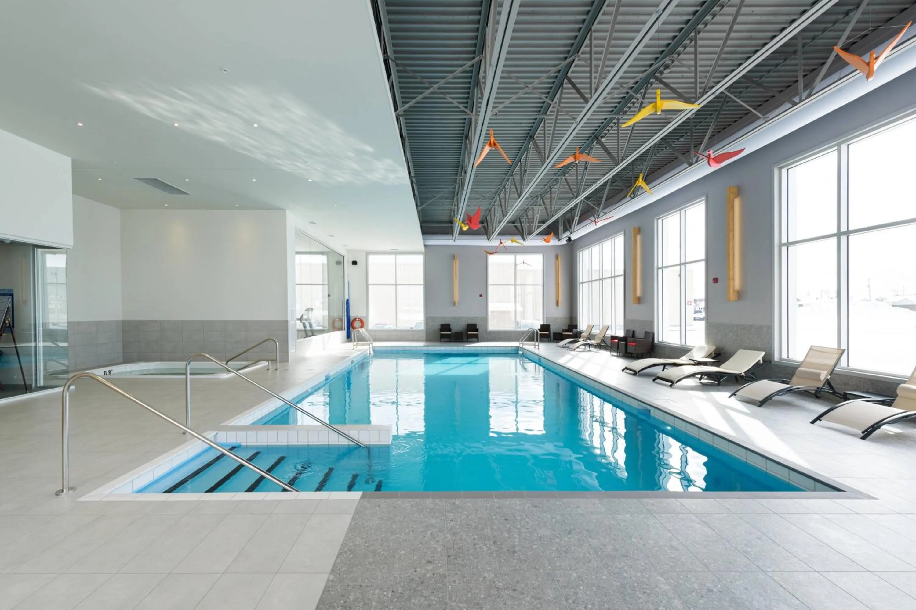 Swimming pool in Delta Hotels by Marriott Saguenay Conference Centre