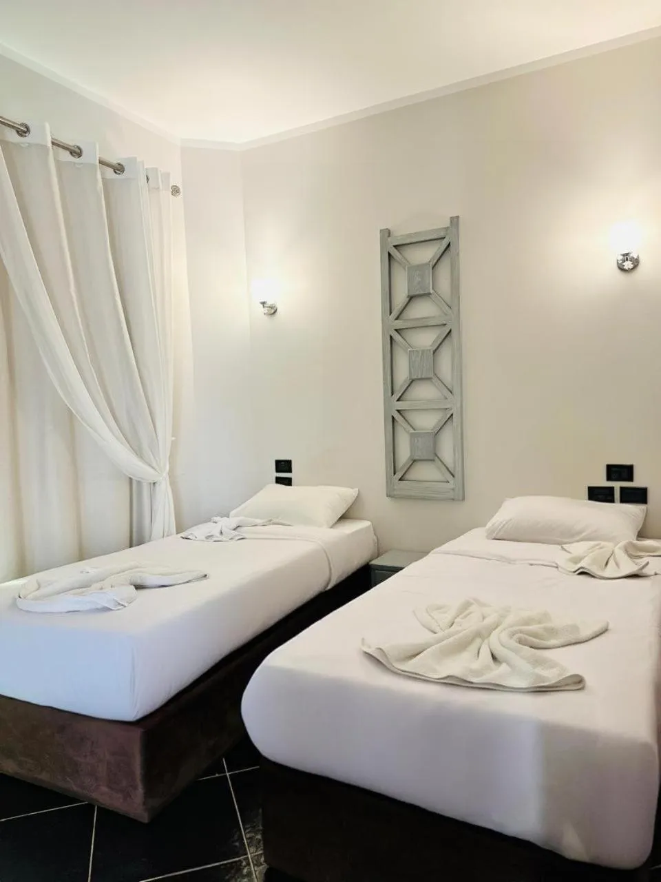 Bed in Royal Beach Serviced Apartments