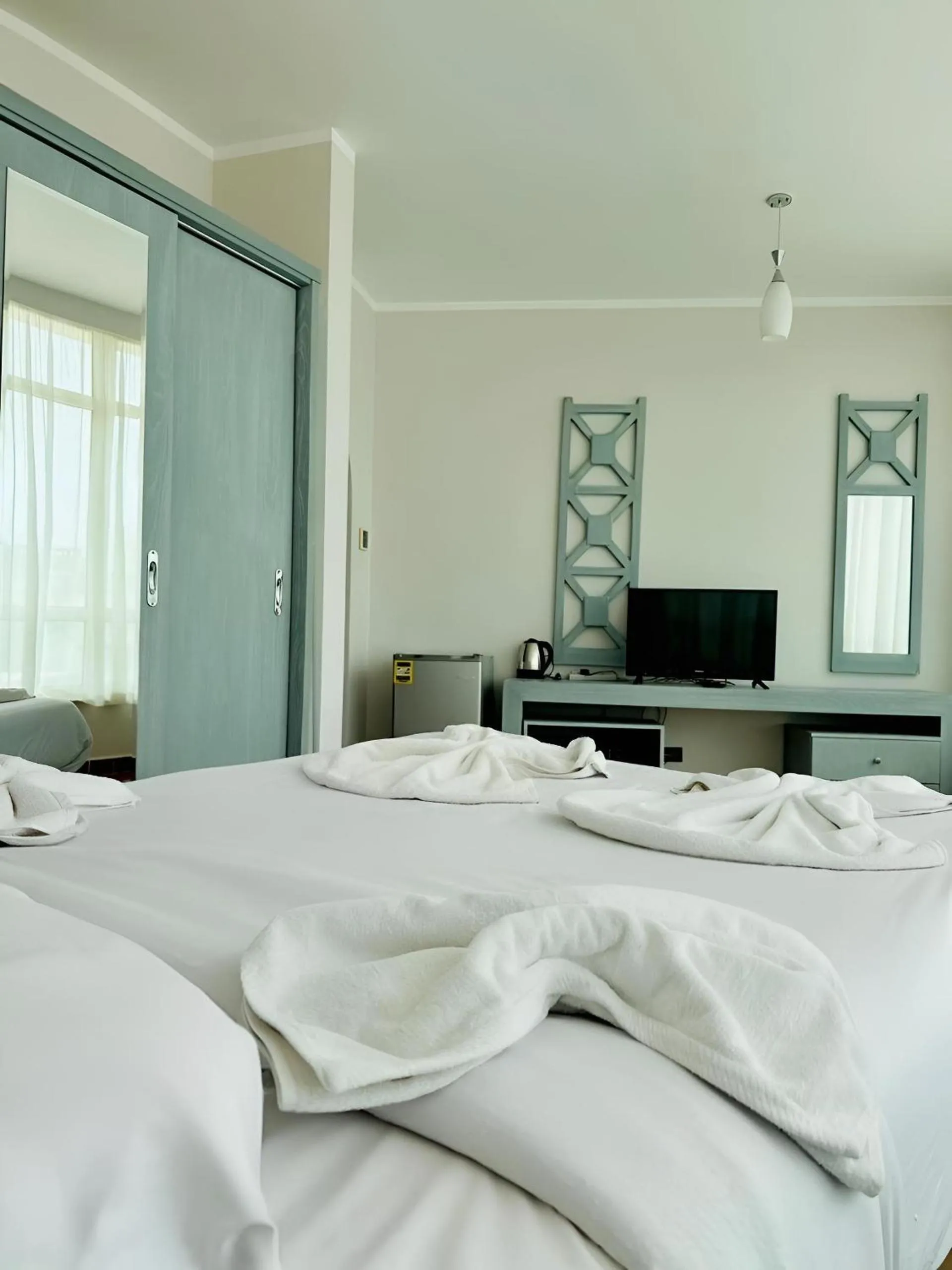 Bed in Royal Beach Serviced Apartments