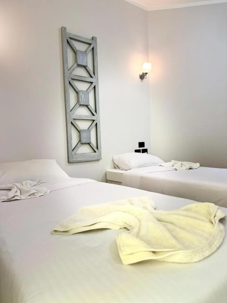 Bed in Royal Beach Serviced Apartments