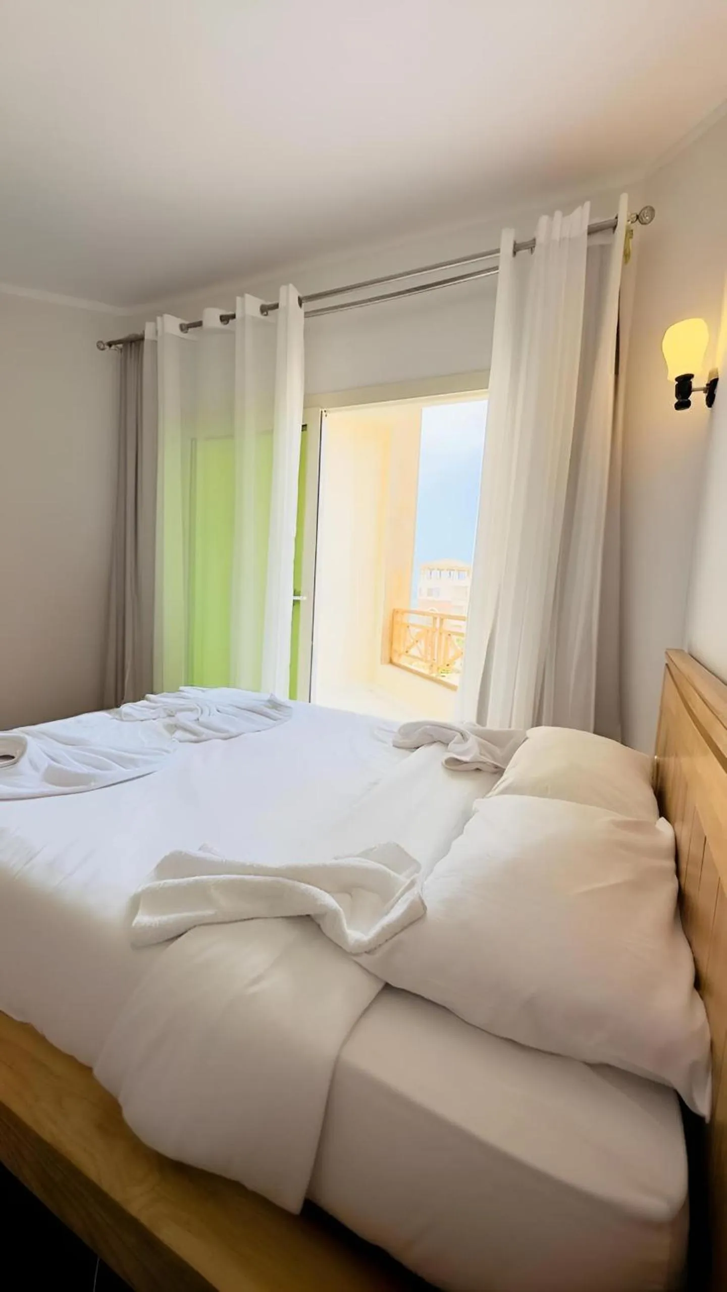 Bed in Royal Beach Serviced Apartments