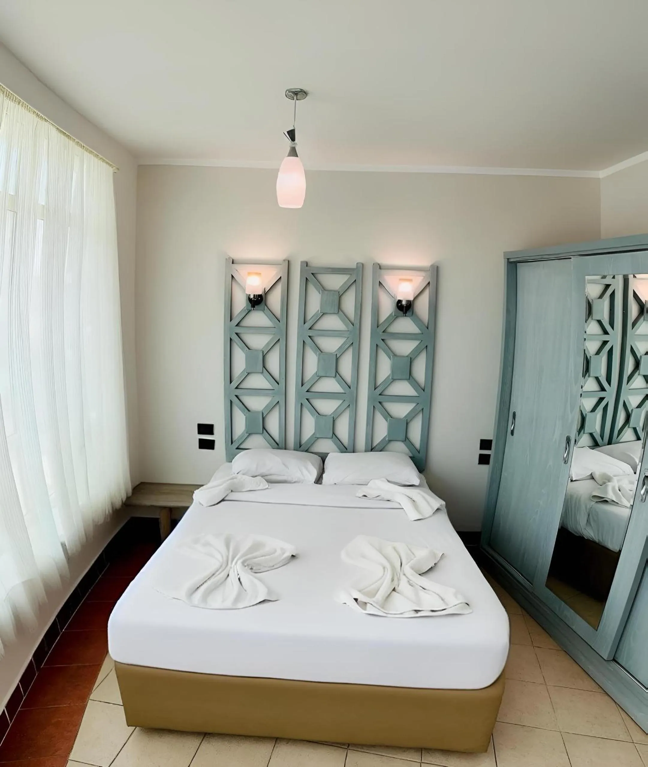 Bed in Royal Beach Serviced Apartments