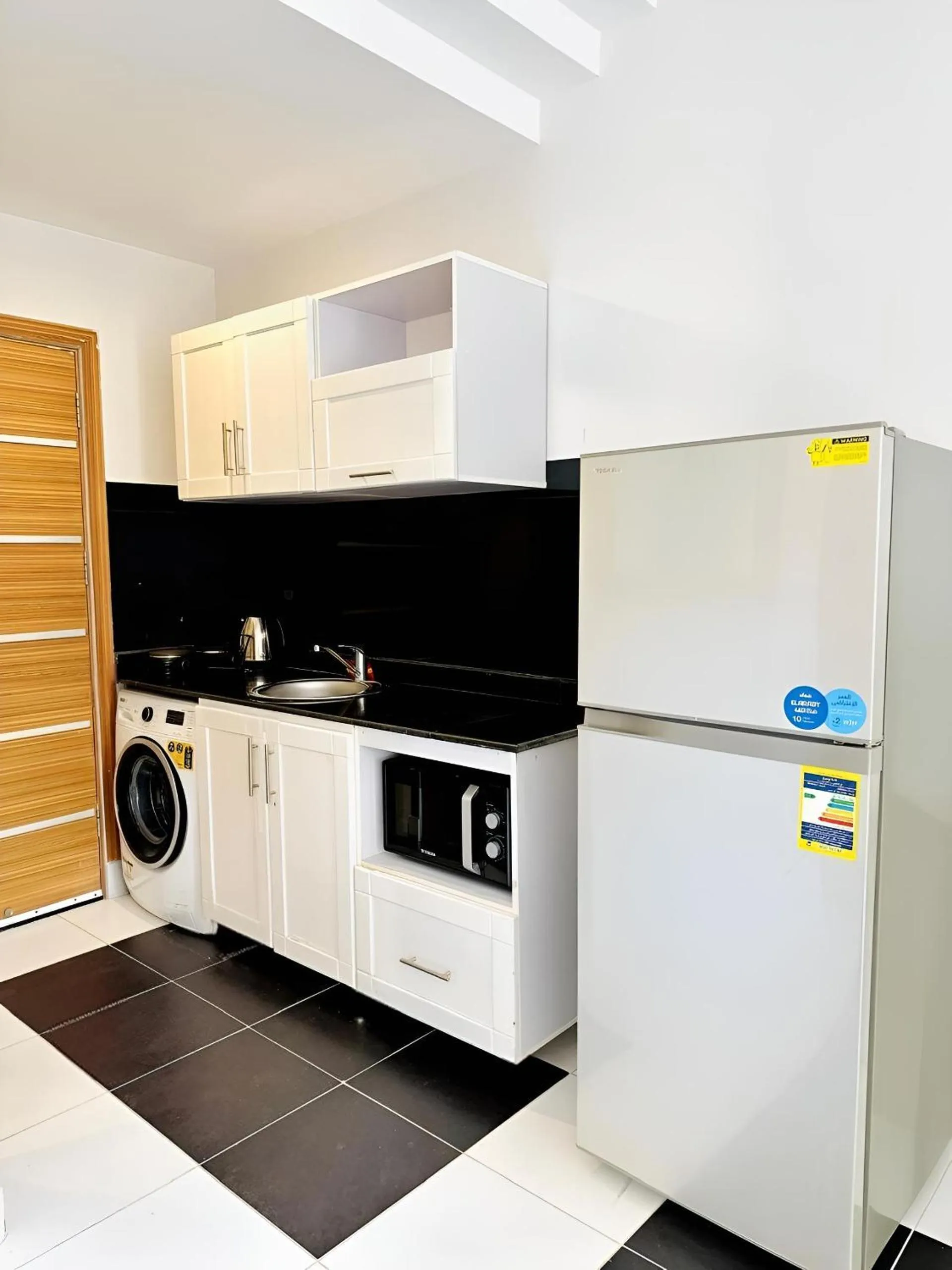 Kitchen or kitchenette in Royal Beach Serviced Apartments
