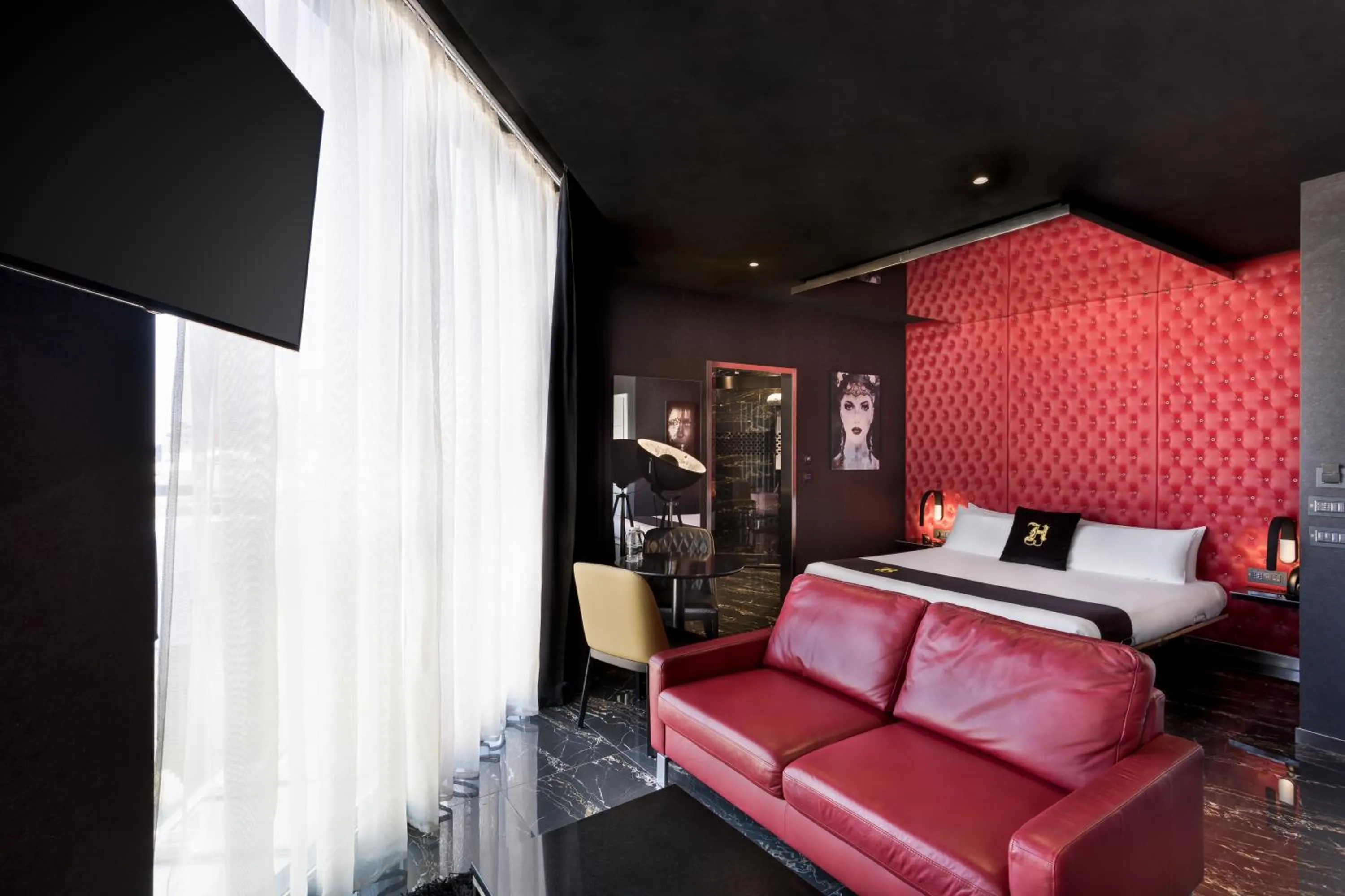 Seating area, Bed in Hugo's Boutique Hotel - Adults Only