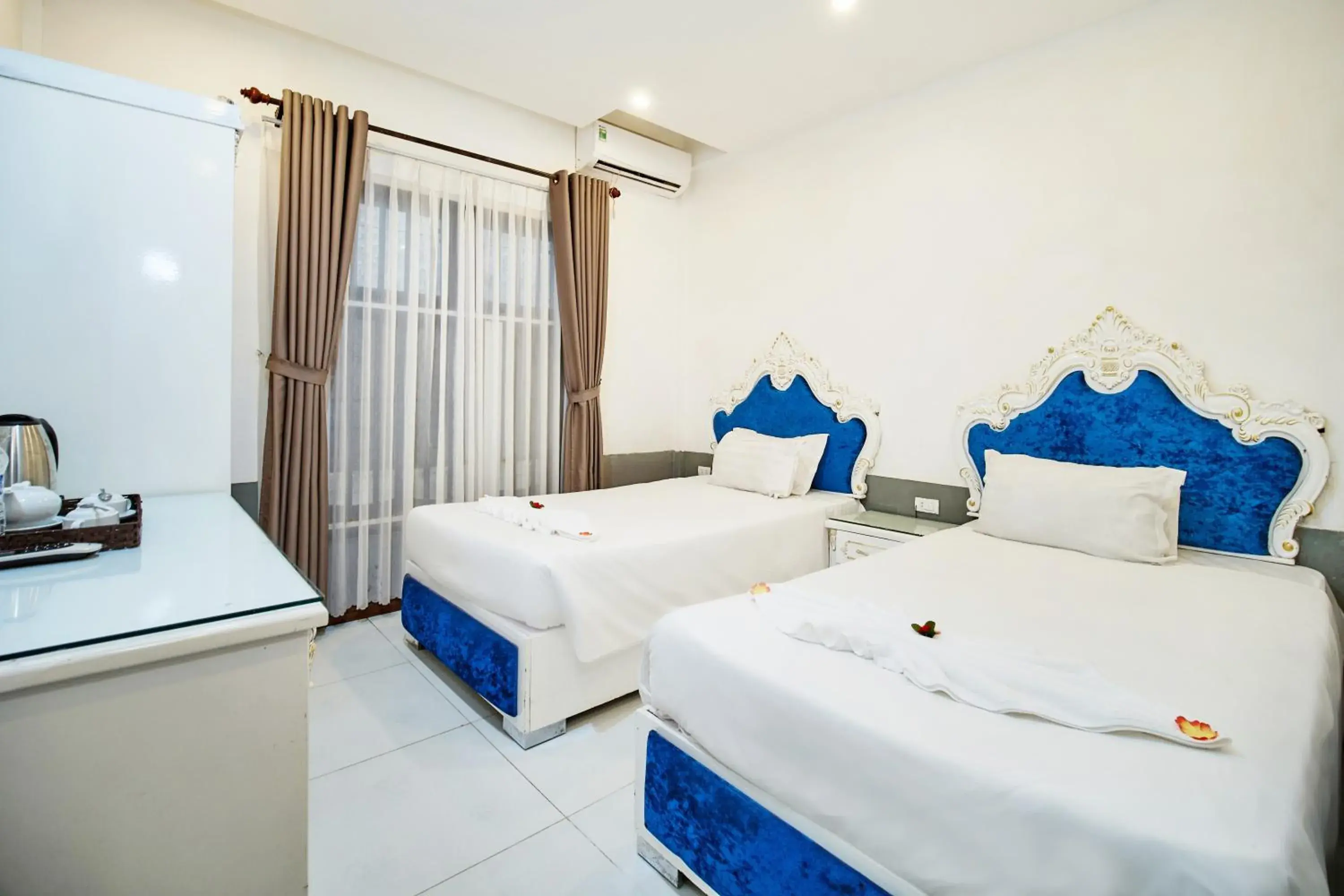 Deluxe Triple Room in Nostalgia Hotel and Spa Deluxe Triple Room in Nostalgia Hotel and Spa