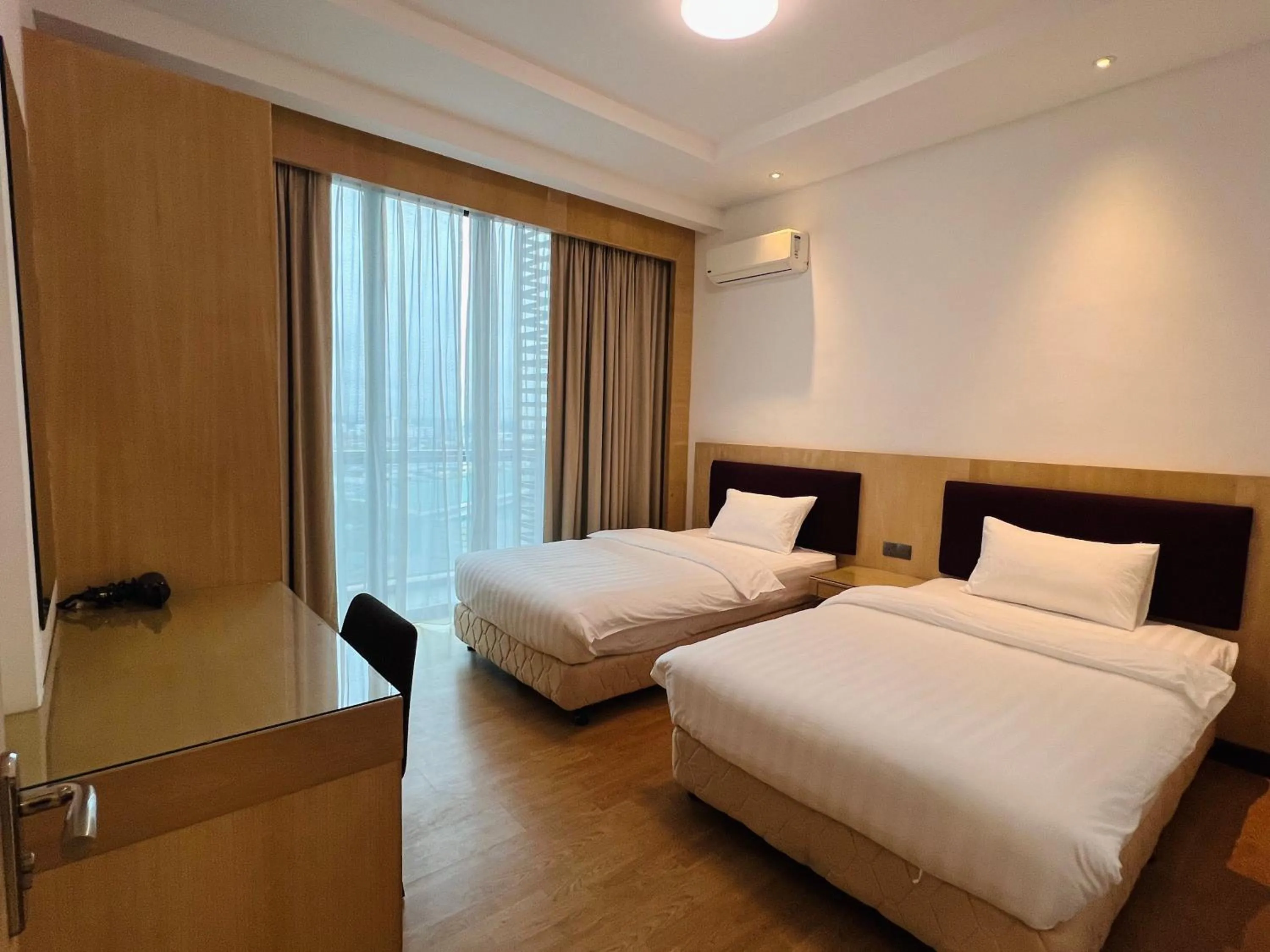 Photo of the whole room, Bed in Imperial Grand Suite Apartment Kuching