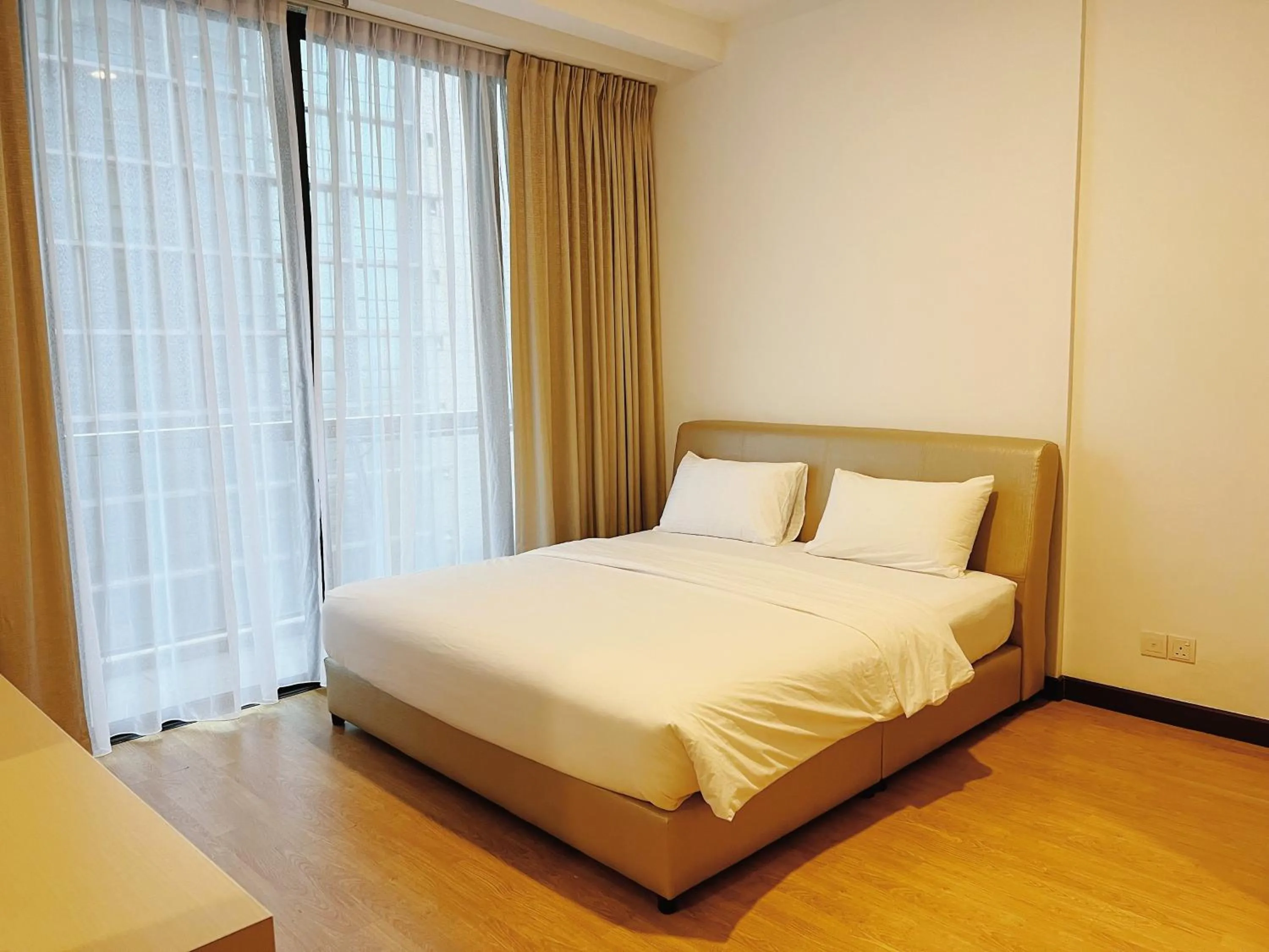 Bed in Imperial Grand Suite Apartment Kuching