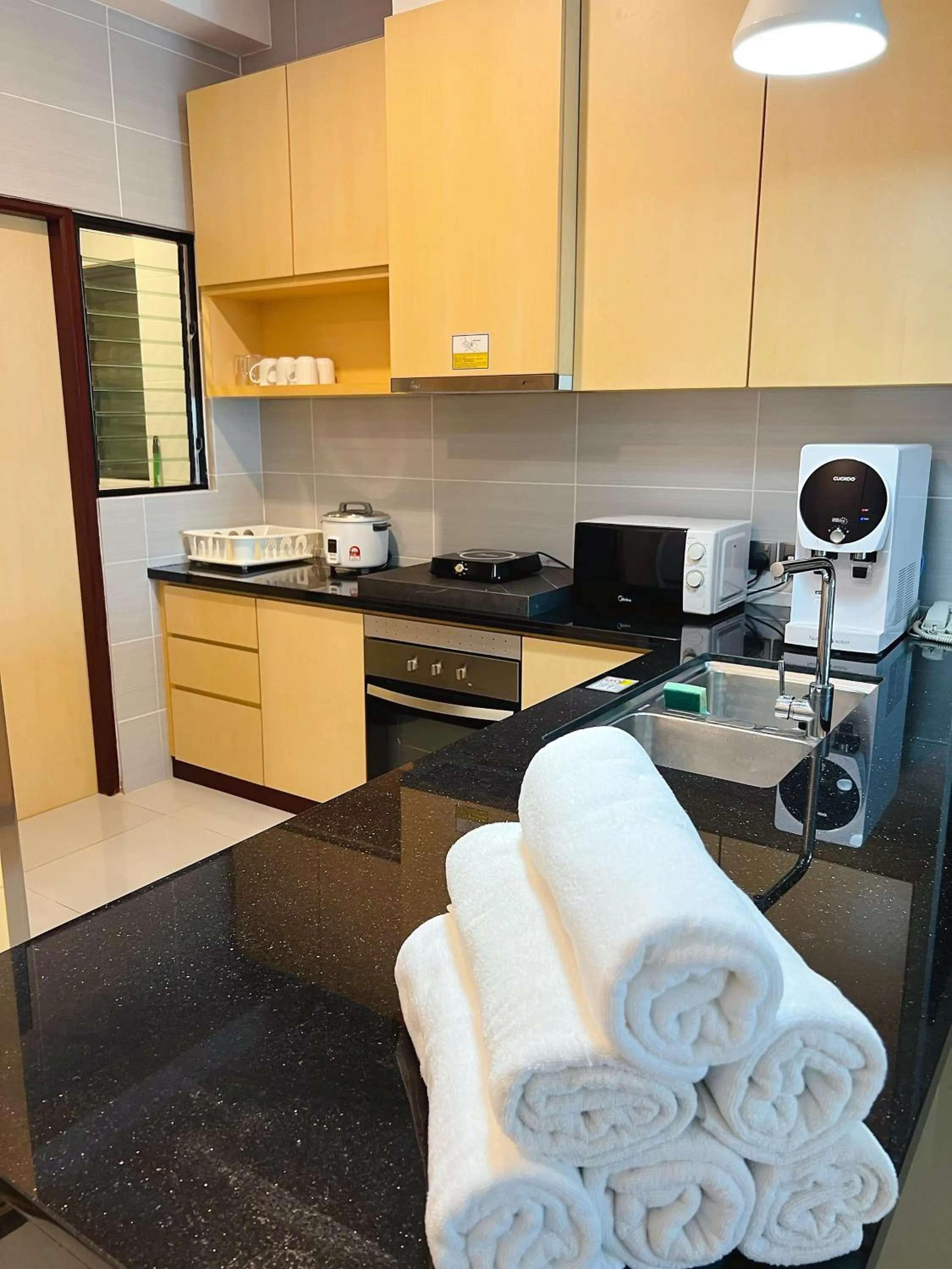 Kitchen or kitchenette in Imperial Grand Suite Apartment Kuching