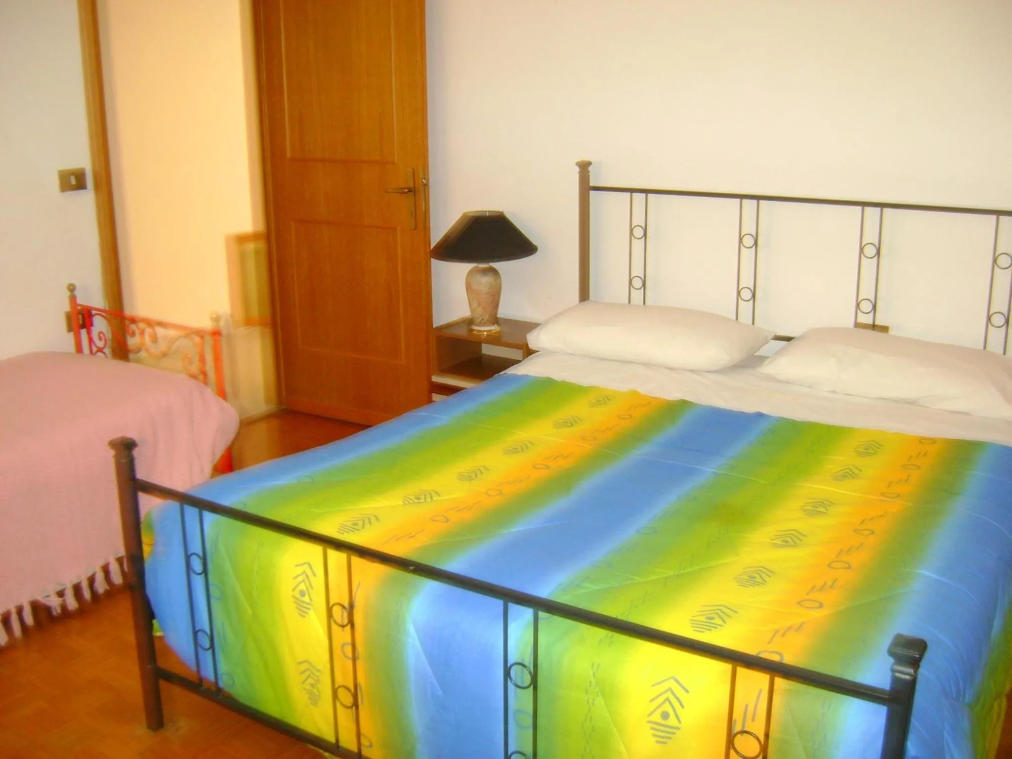 Bed in B&B La Mimosa