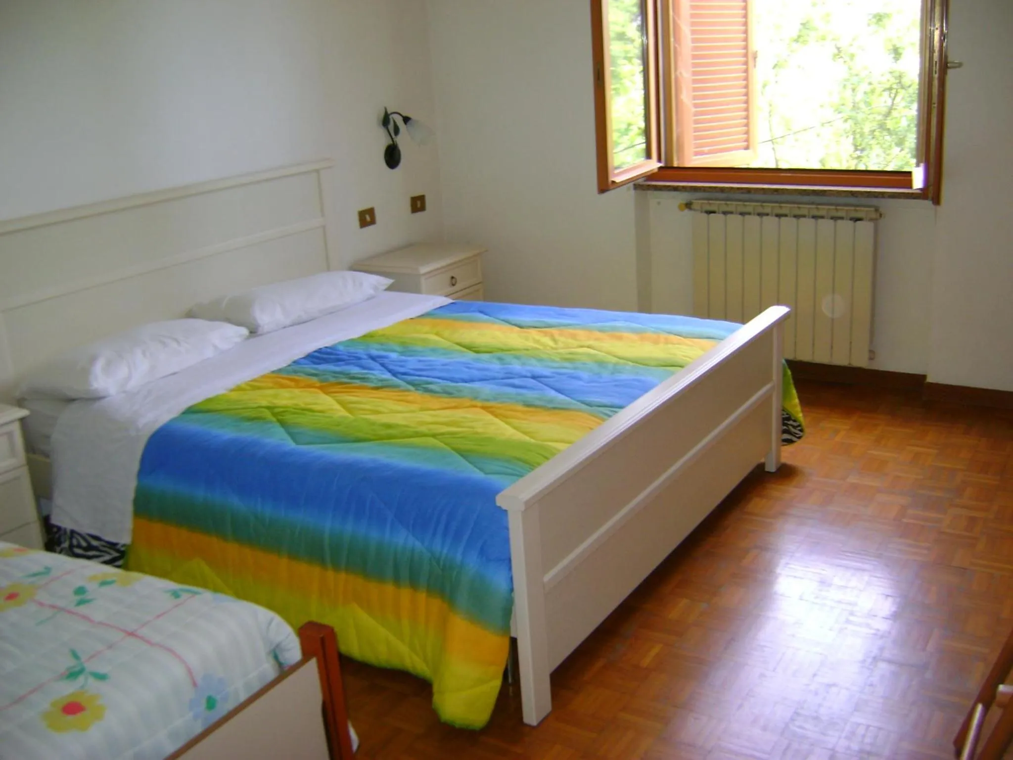 Bed in B&B La Mimosa