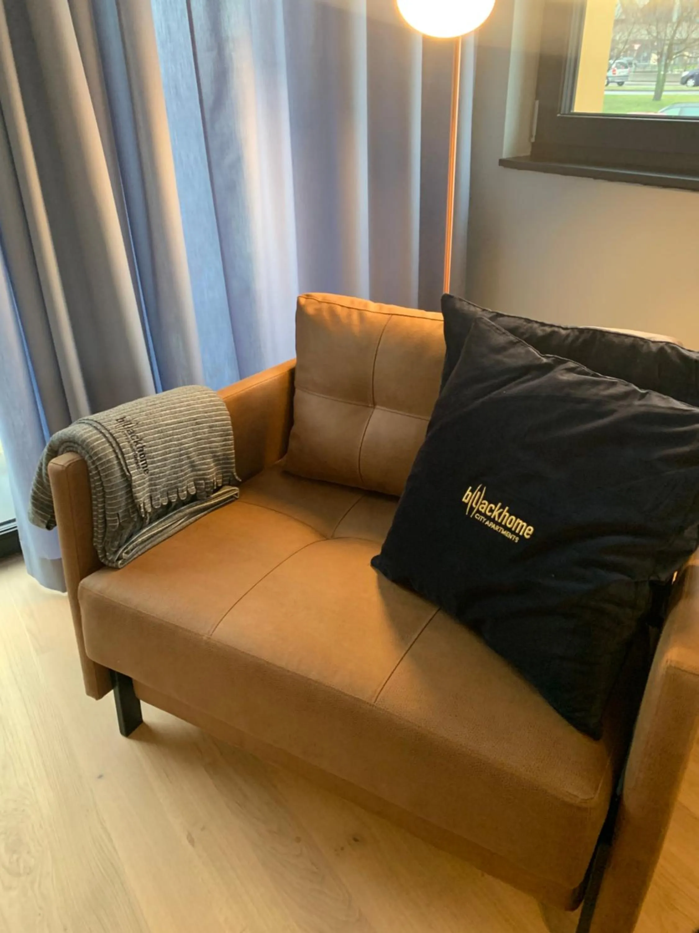 Seating area in Blackhome Innsbruck City East I contactless check-in