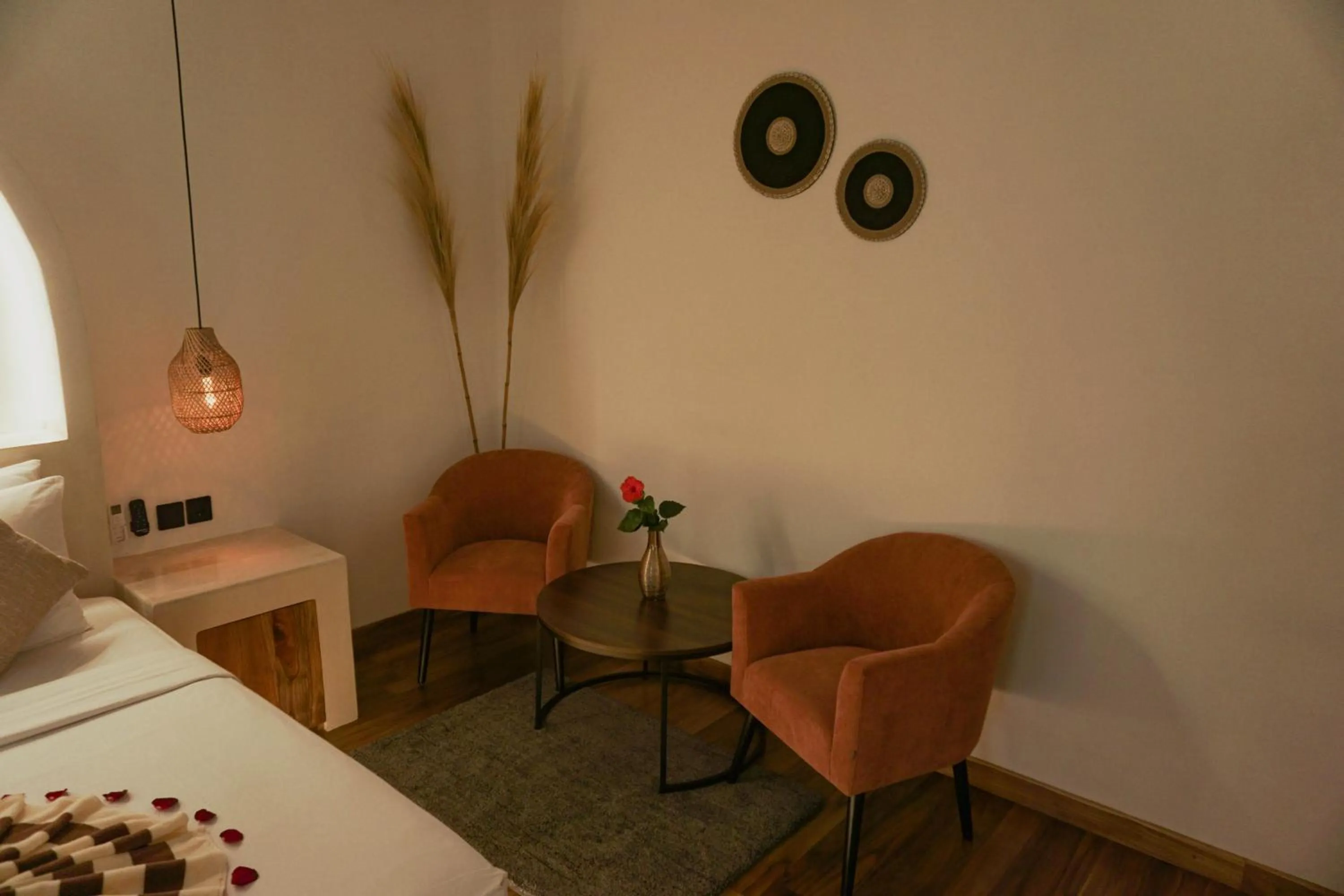 Seating area, Bed in Jungle Haven Resort Central Ubud