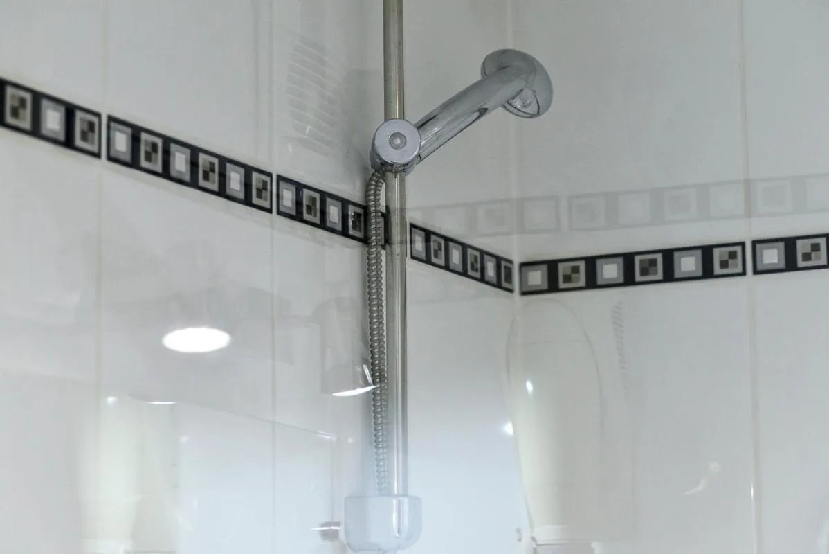 Bathroom in Hôtel Paris Nord