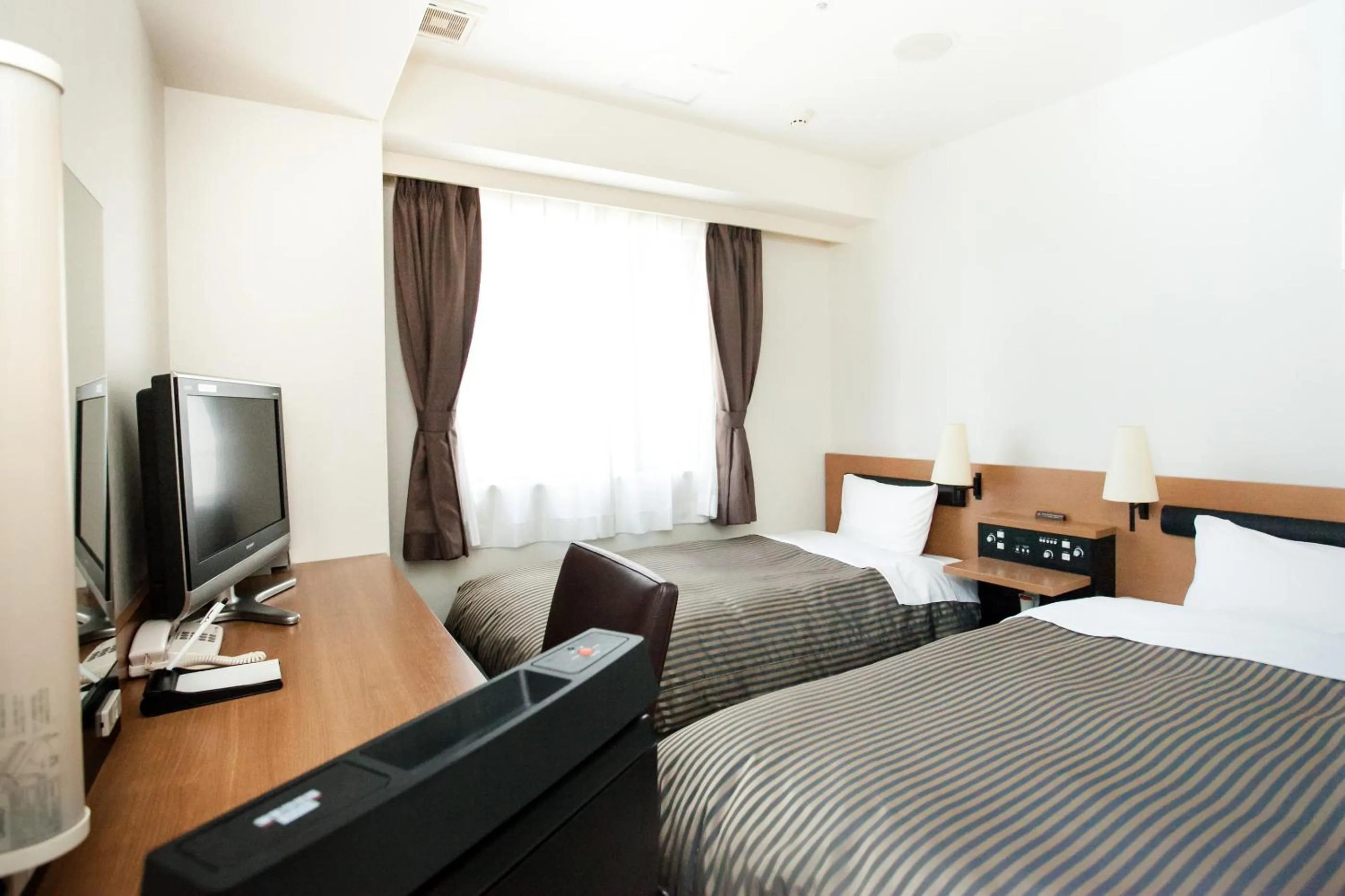 Photo of the whole room, TV/Entertainment Center in Via Inn Hiroshima Kanayamacho