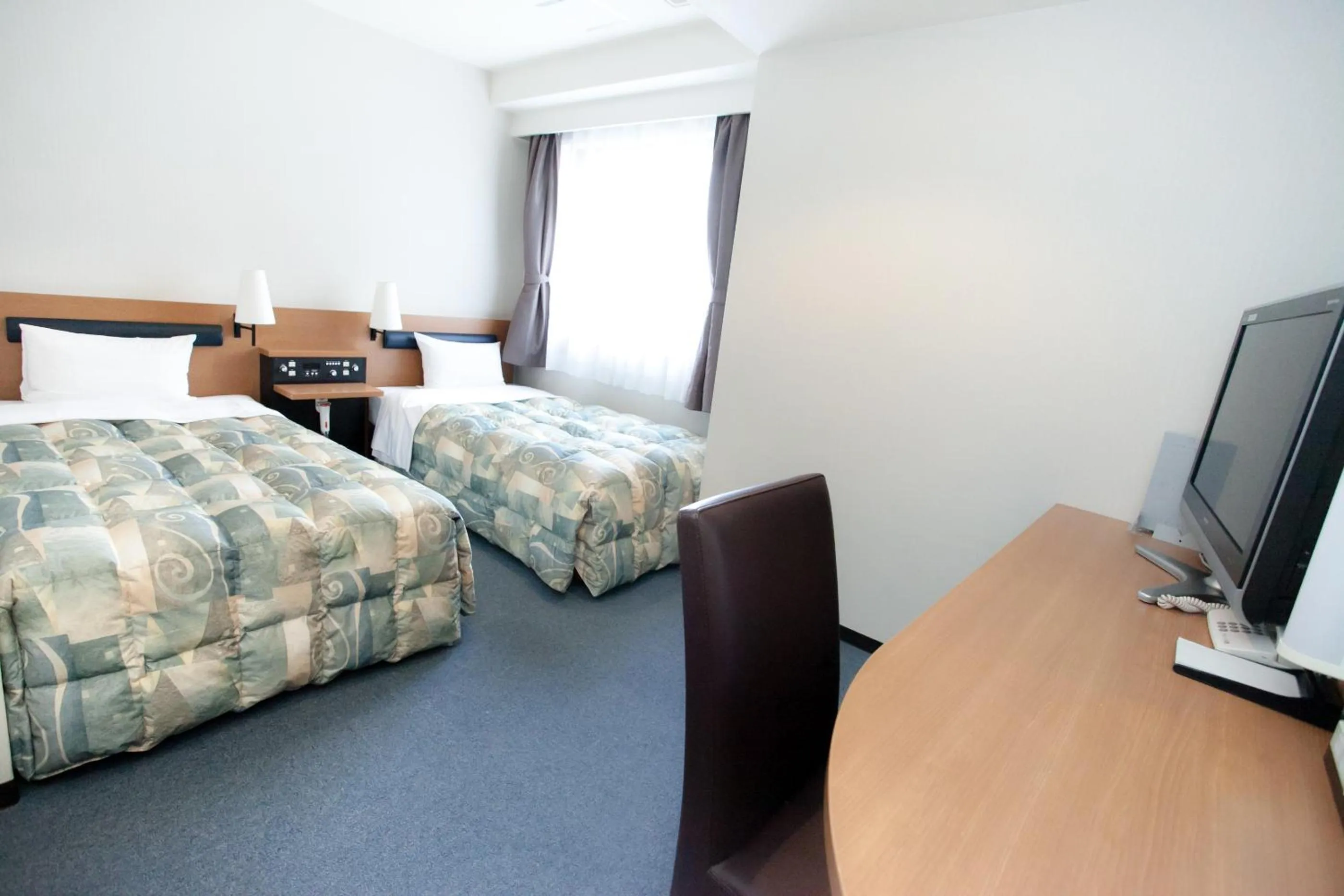 Photo of the whole room, TV/Entertainment Center in Via Inn Hiroshima Kanayamacho
