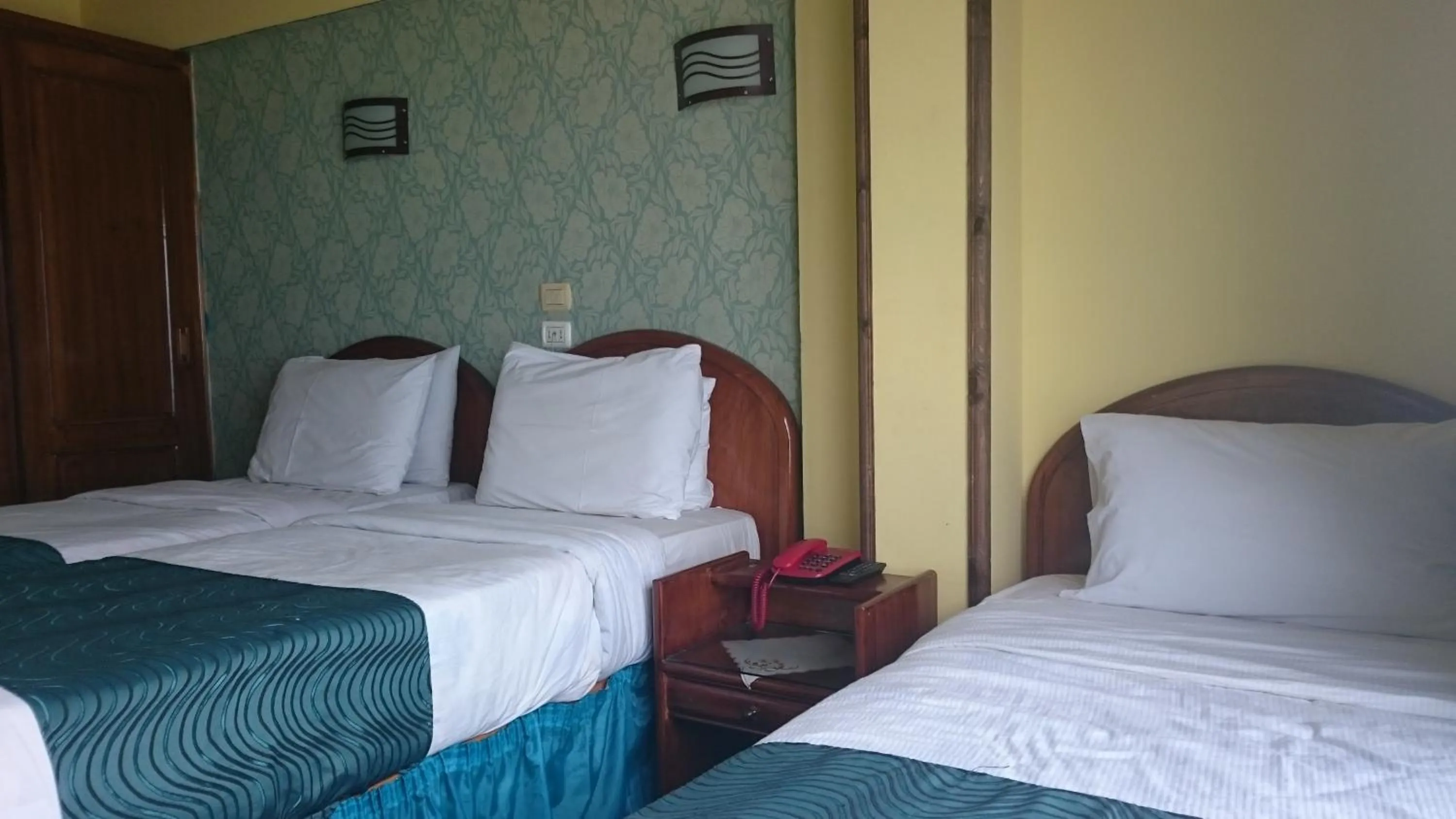 Photo of the whole room, Bed in Royal Crown Hotel عائلات مصرية فقط Egyptian Families only