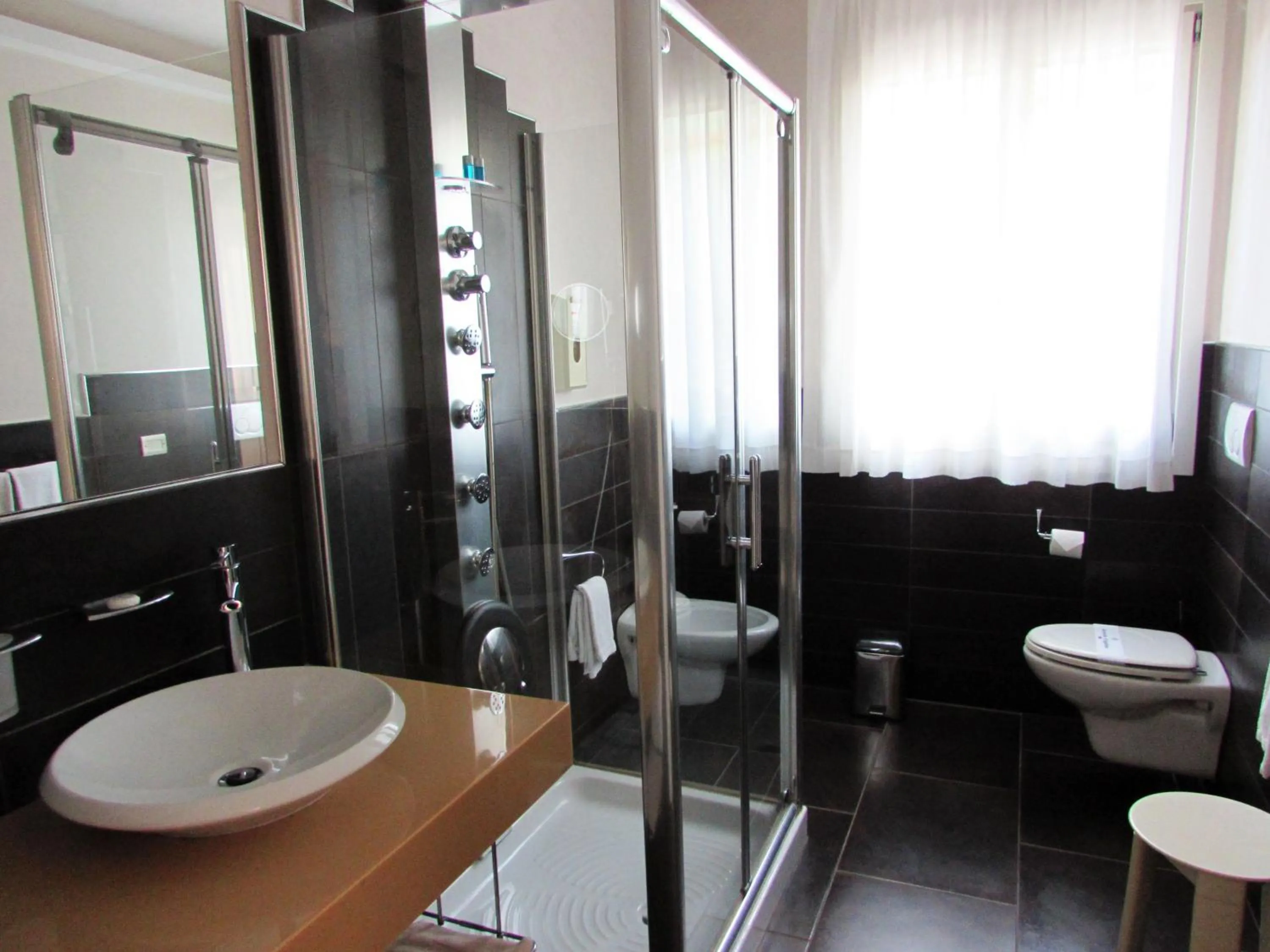 Bathroom in Hotel Dante Residence