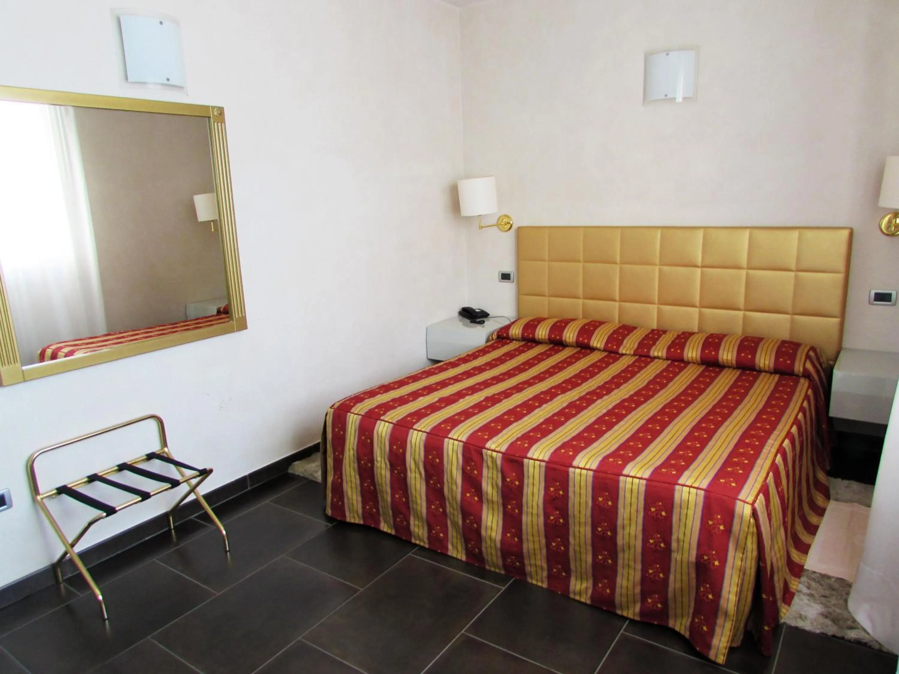 Bed in Hotel Dante Residence