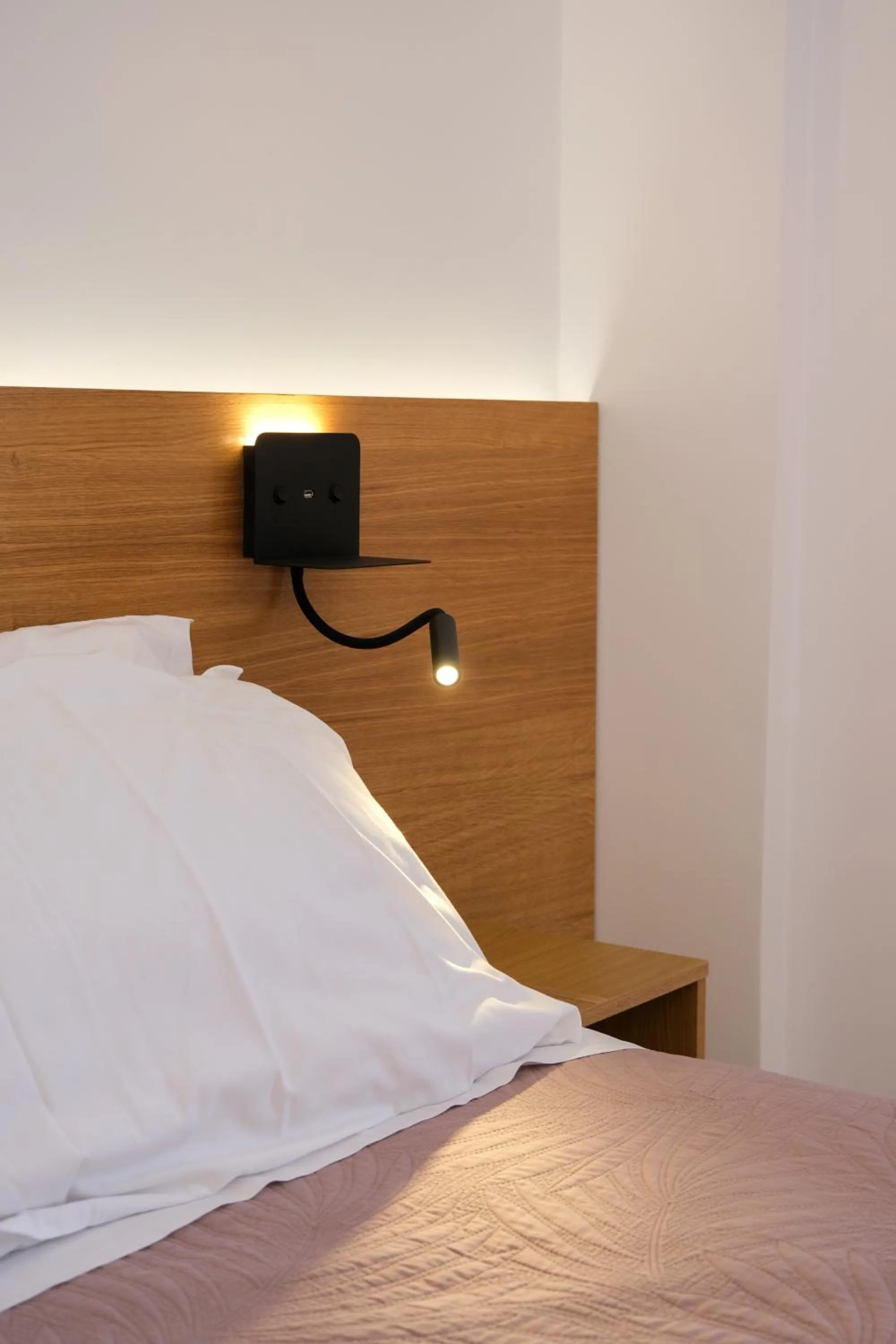 Bed in Arocaria Apartments