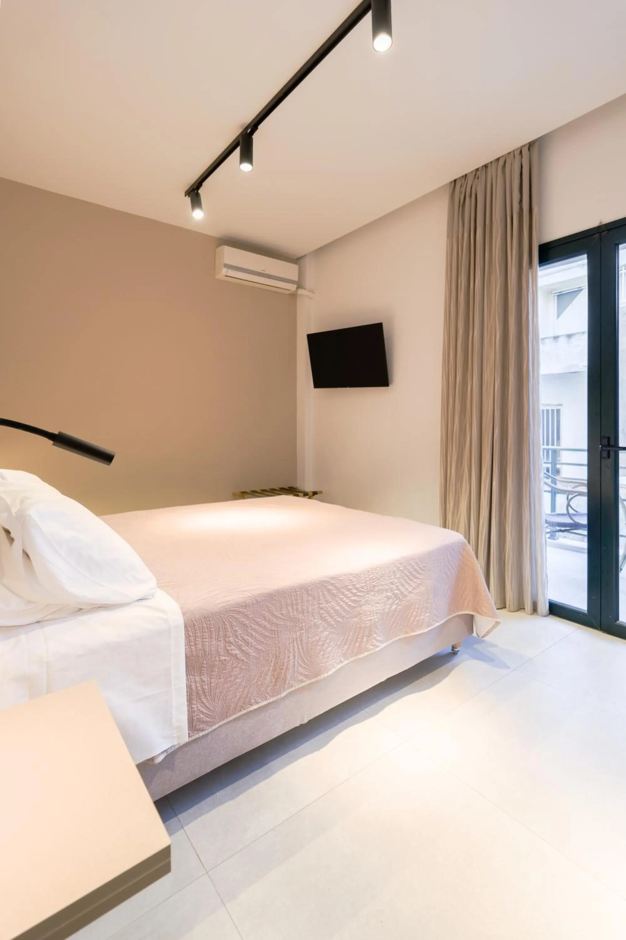 Bed in Arocaria Apartments