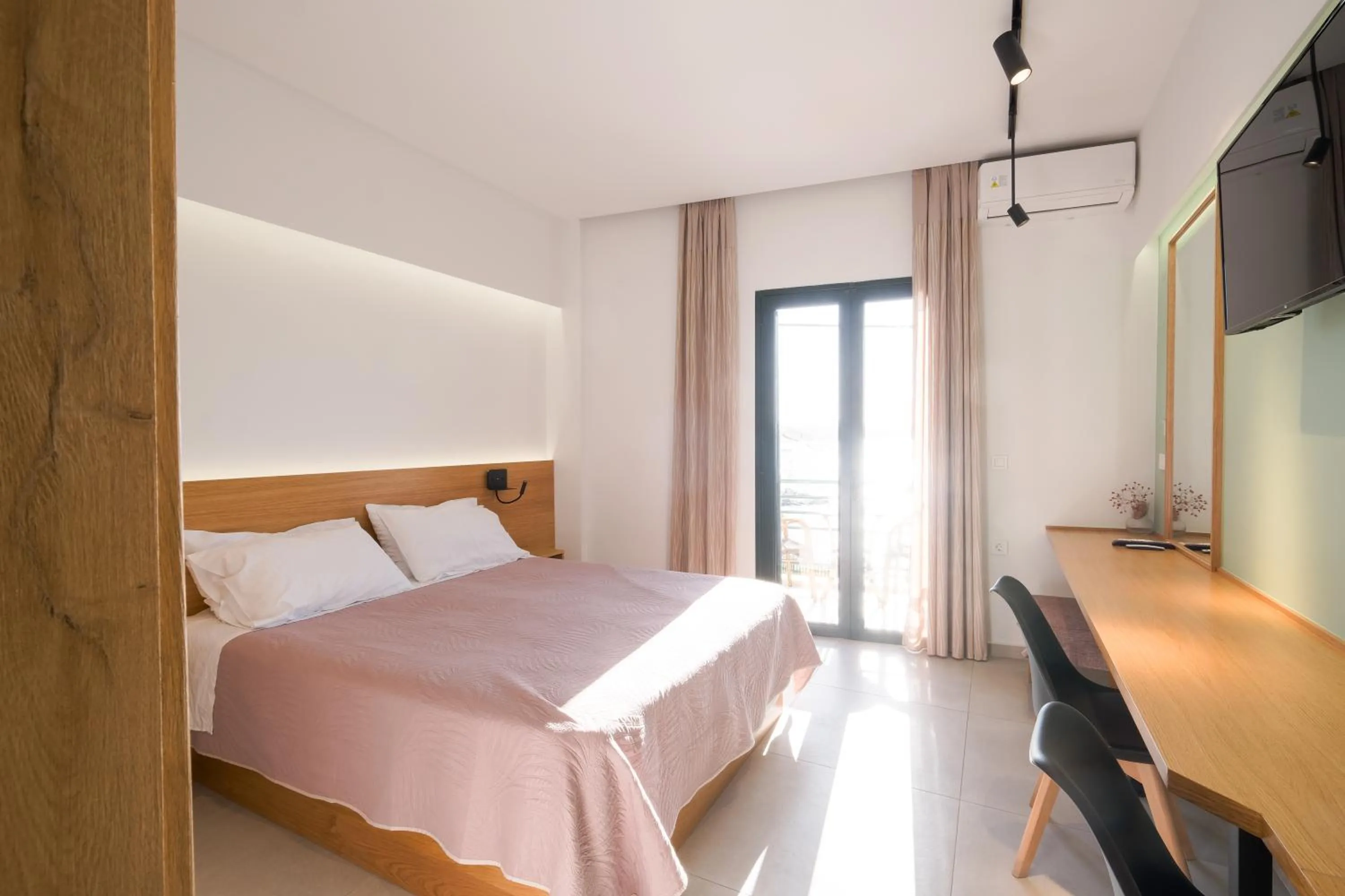 Bed in Arocaria Apartments