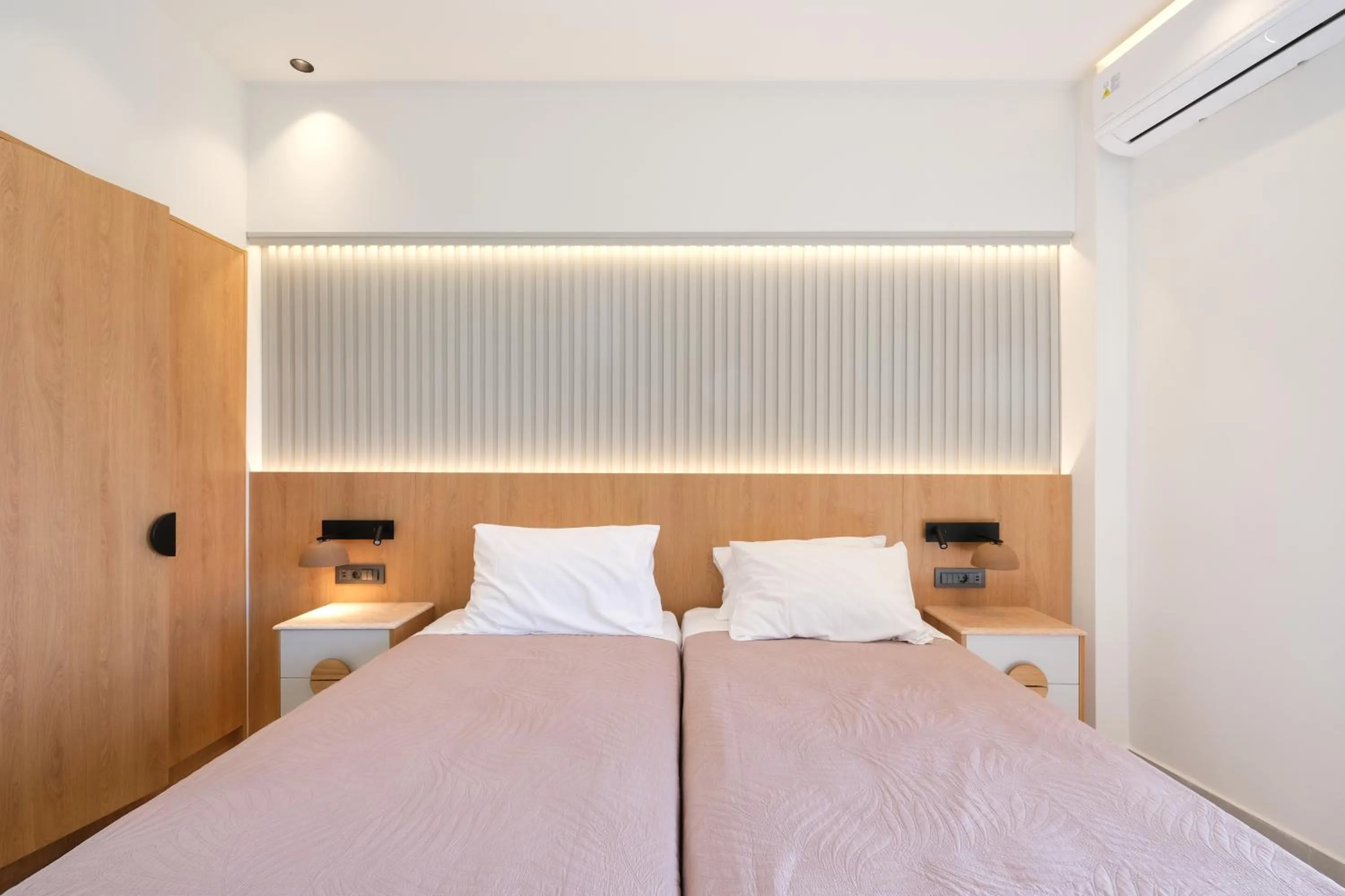 Bed in Arocaria Apartments