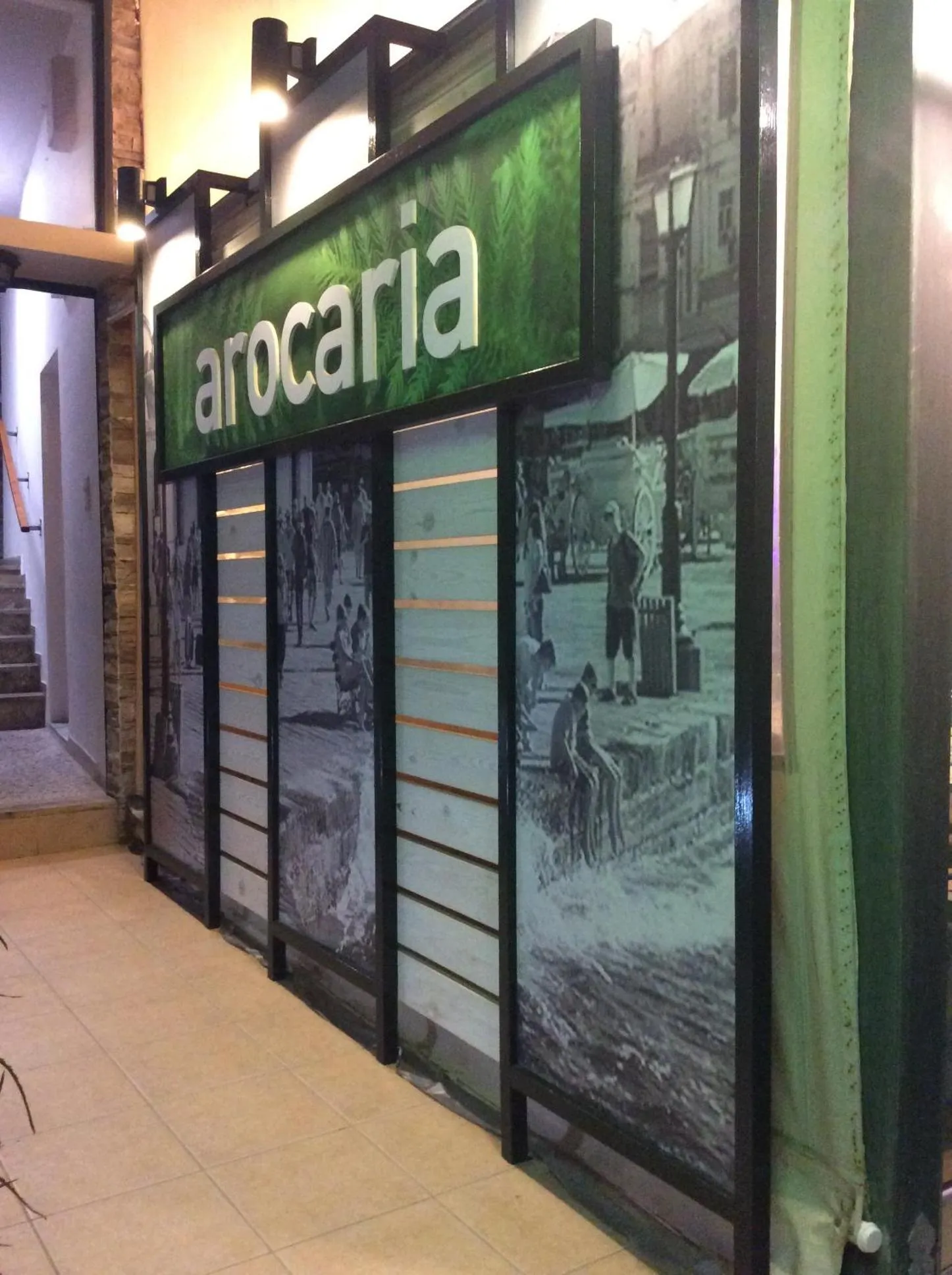 Property logo or sign in Arocaria Apartments