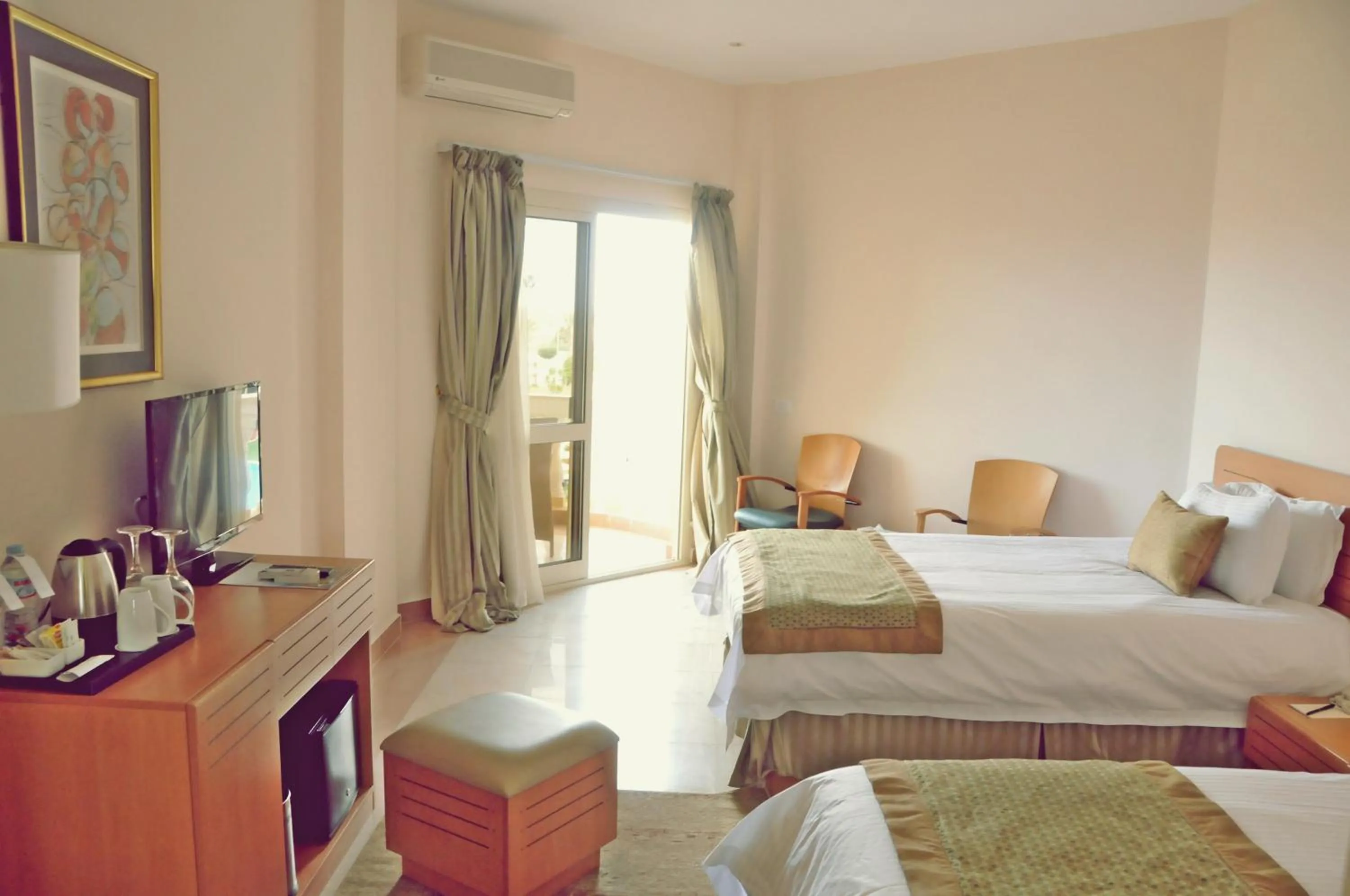 Bedroom, Bed in Tolip Family Club Borg El Arab