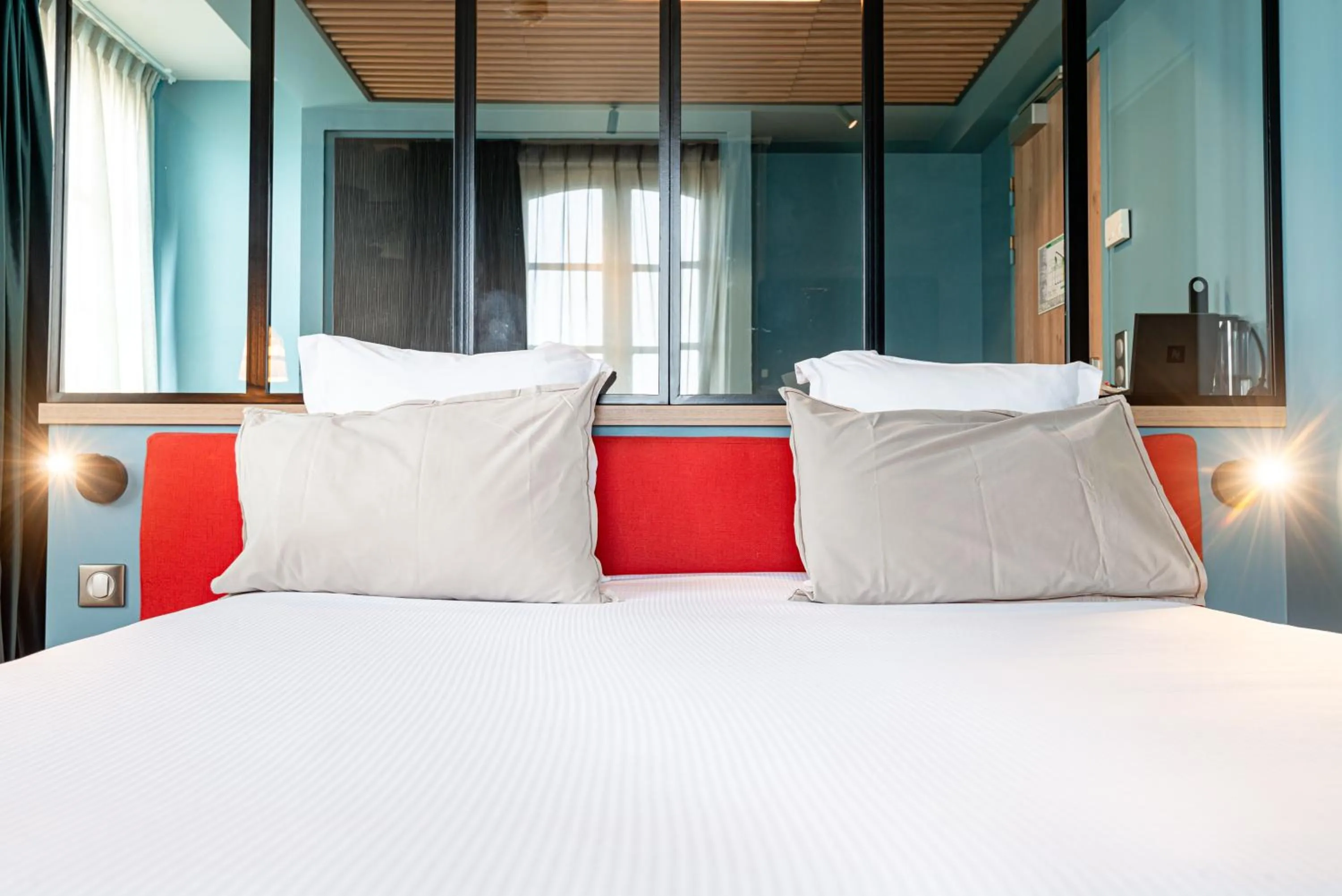 Bed in Hôtel de la Cité