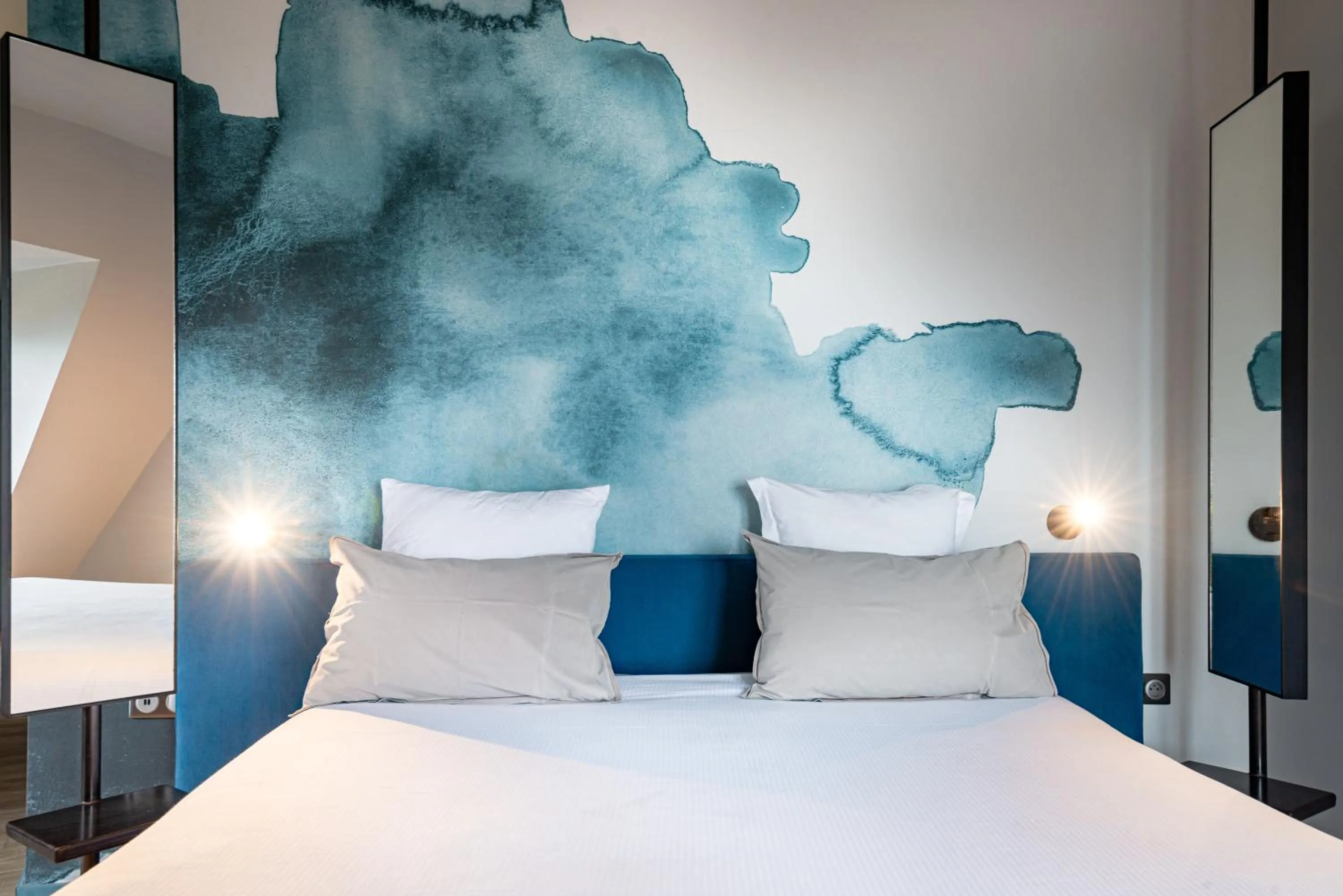 Bed in Hôtel de la Cité