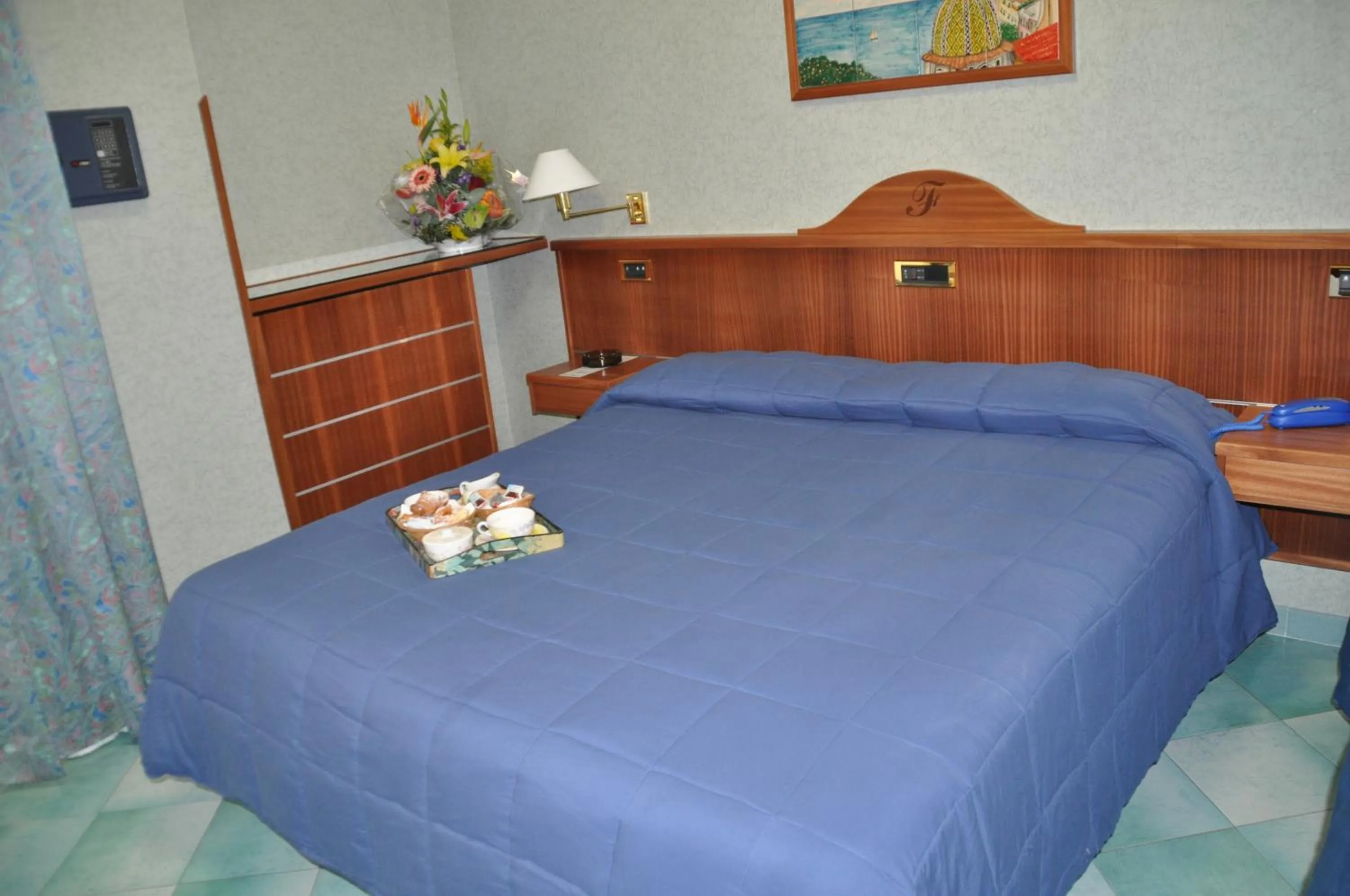 Bed in Albergo Fiorenza