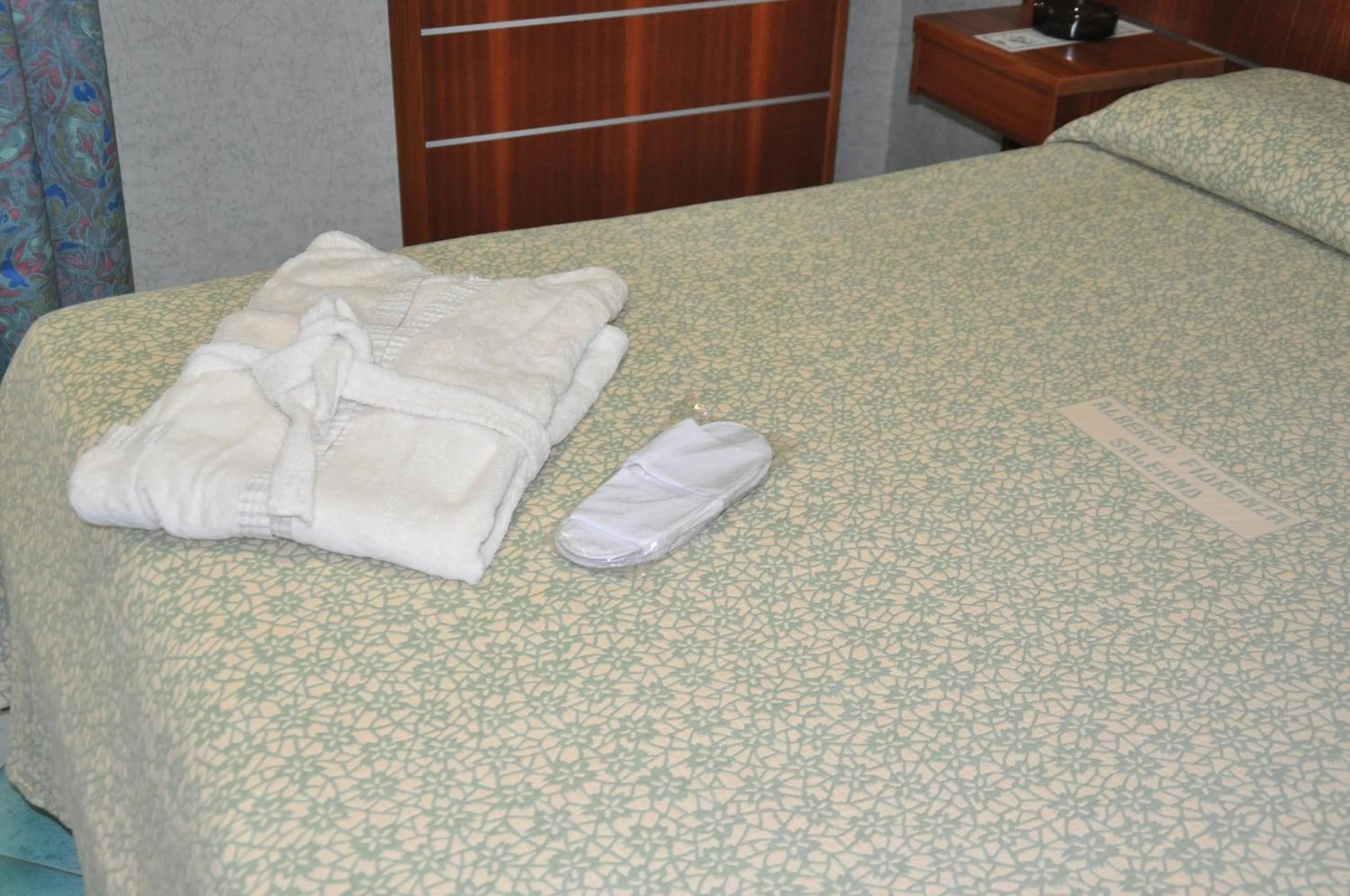 Bed in Albergo Fiorenza