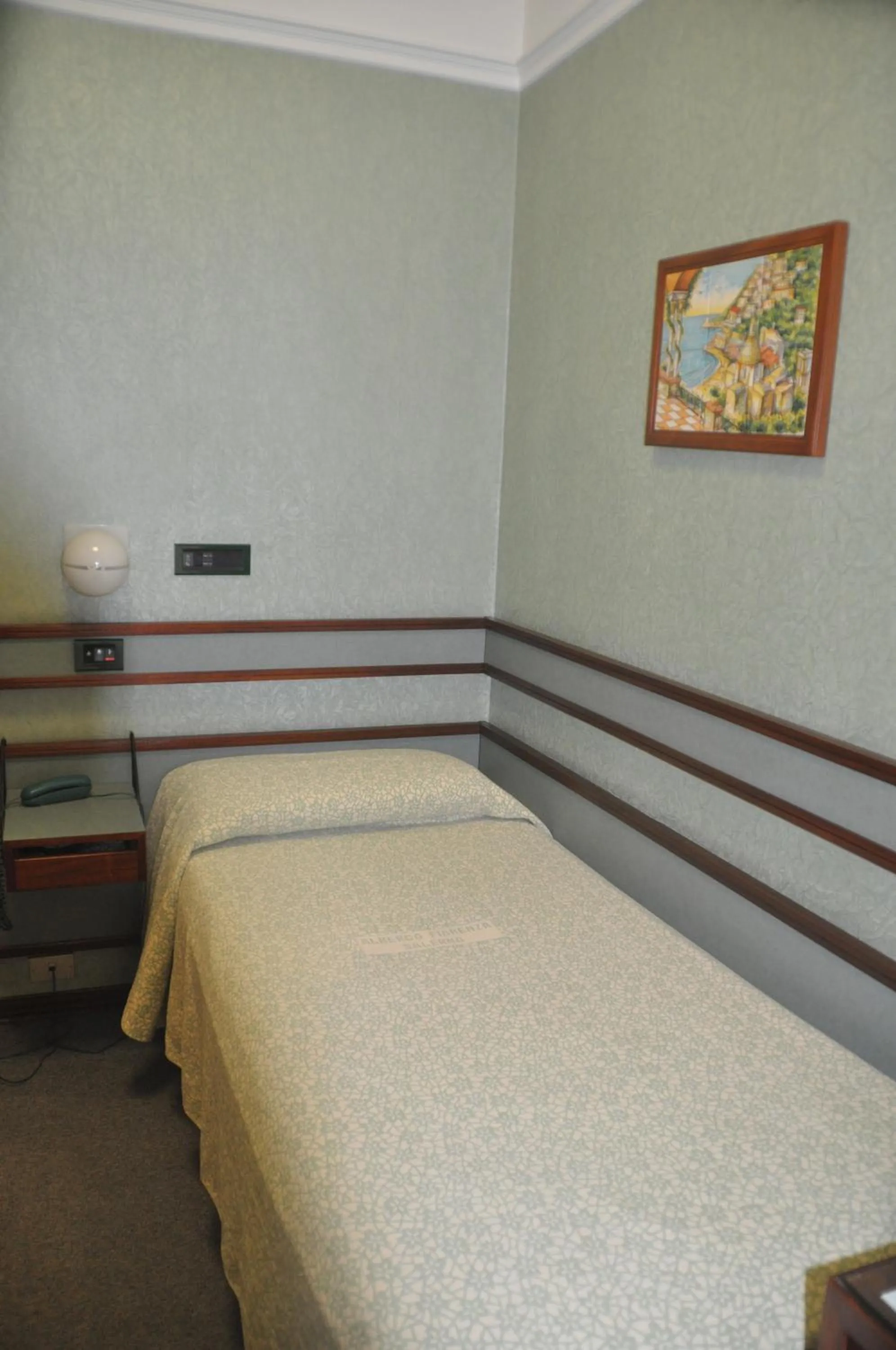 Bed in Albergo Fiorenza