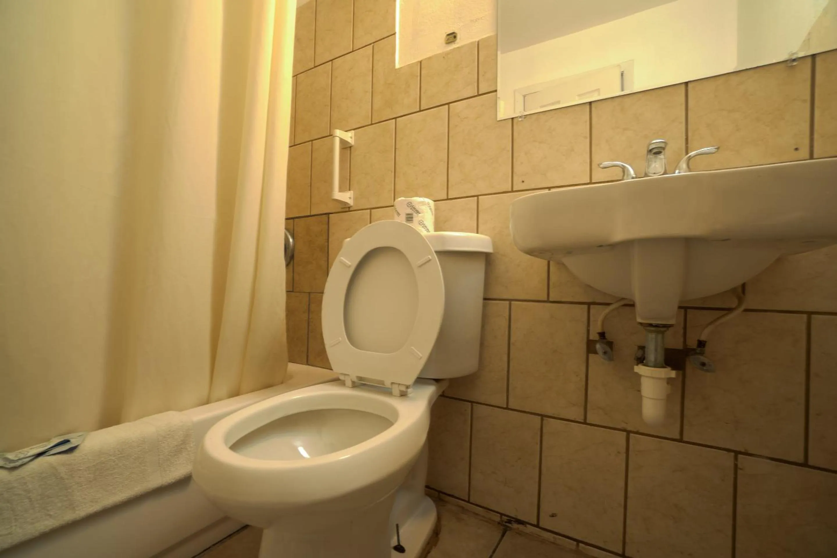 Bathroom in Monterrey Motel Padre Island, Corpus Christi BY OYO