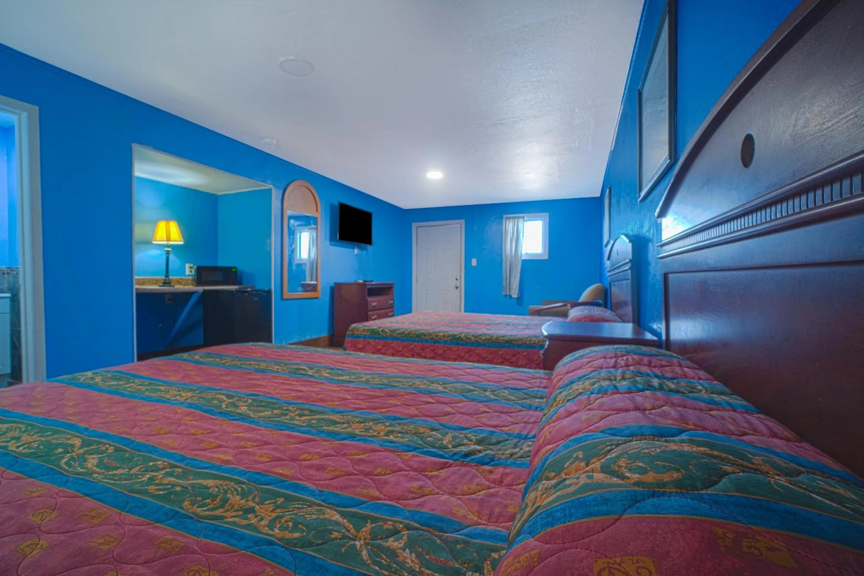 Bedroom, Bed in Monterrey Motel Padre Island, Corpus Christi BY OYO