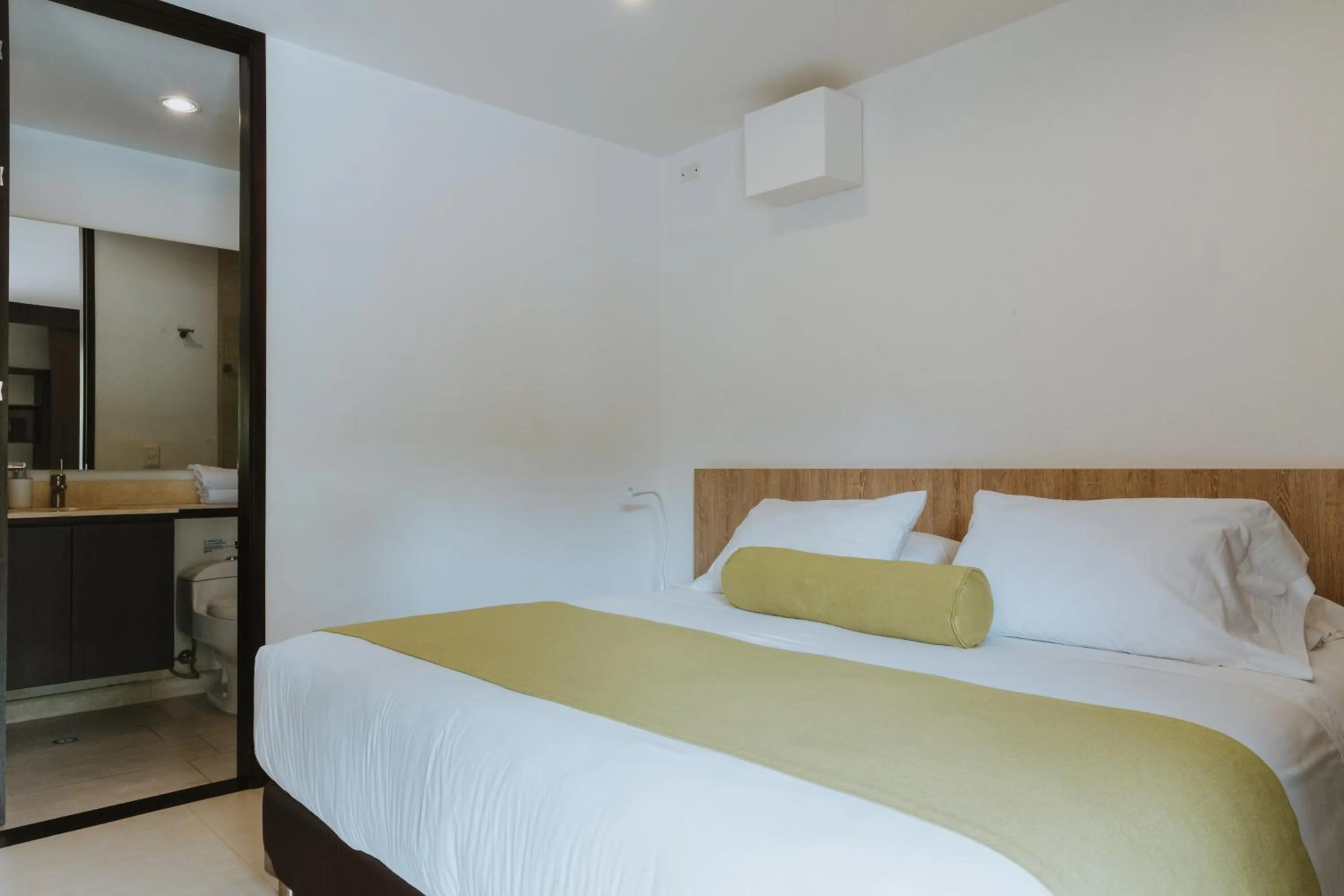 Bed in Travelers Rio Verde Living Suites