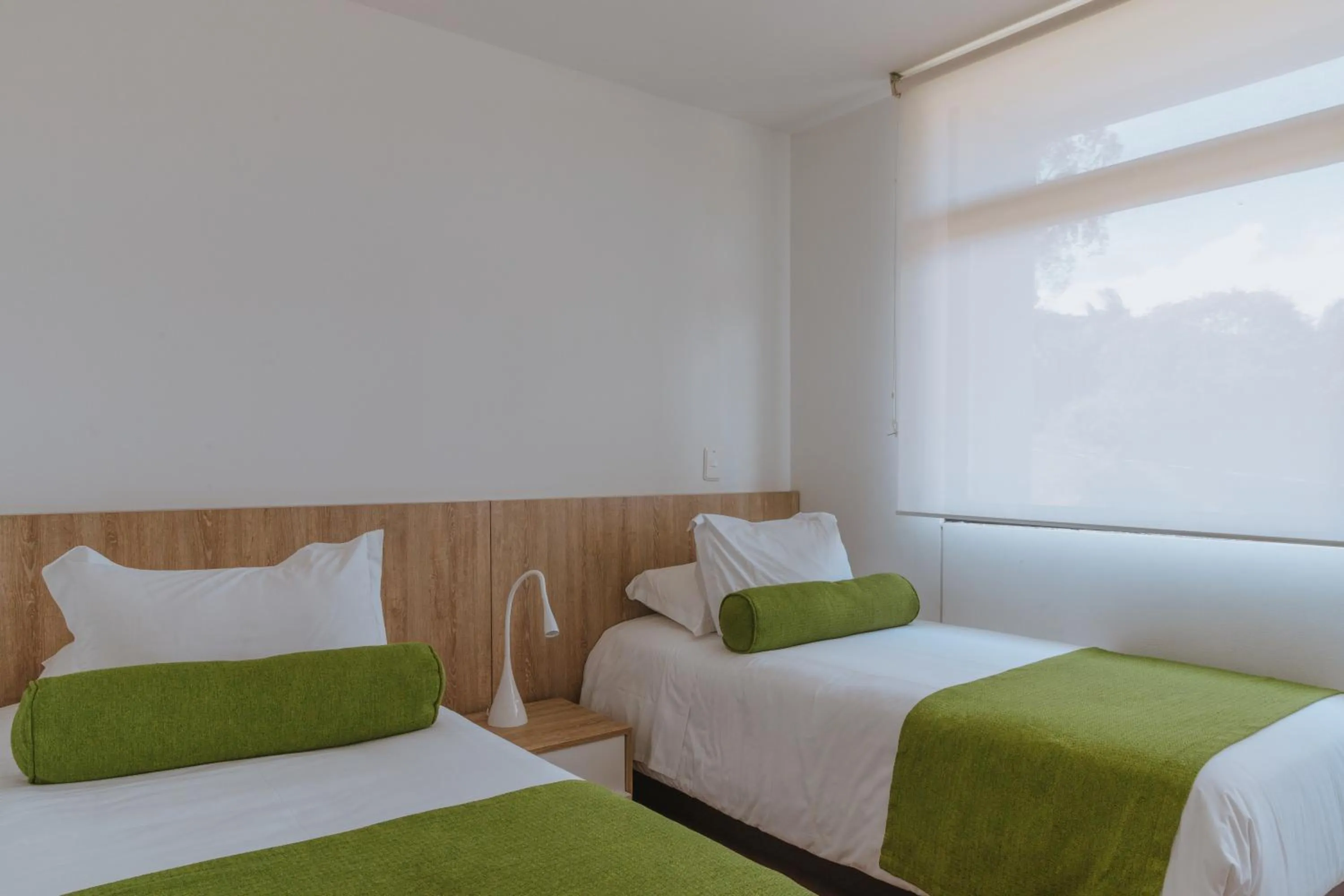 Bed in Travelers Rio Verde Living Suites