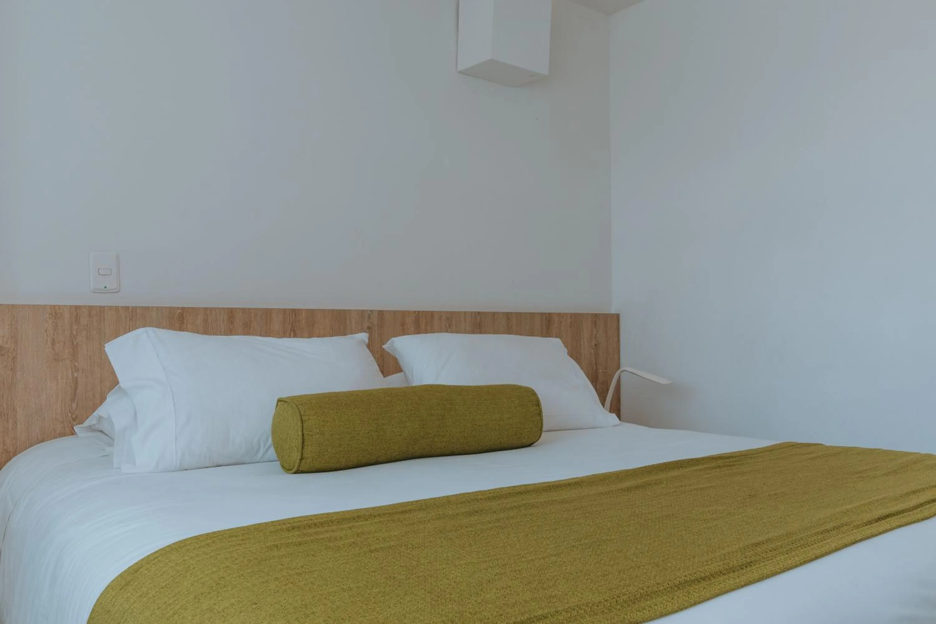 Bed in Travelers Rio Verde Living Suites